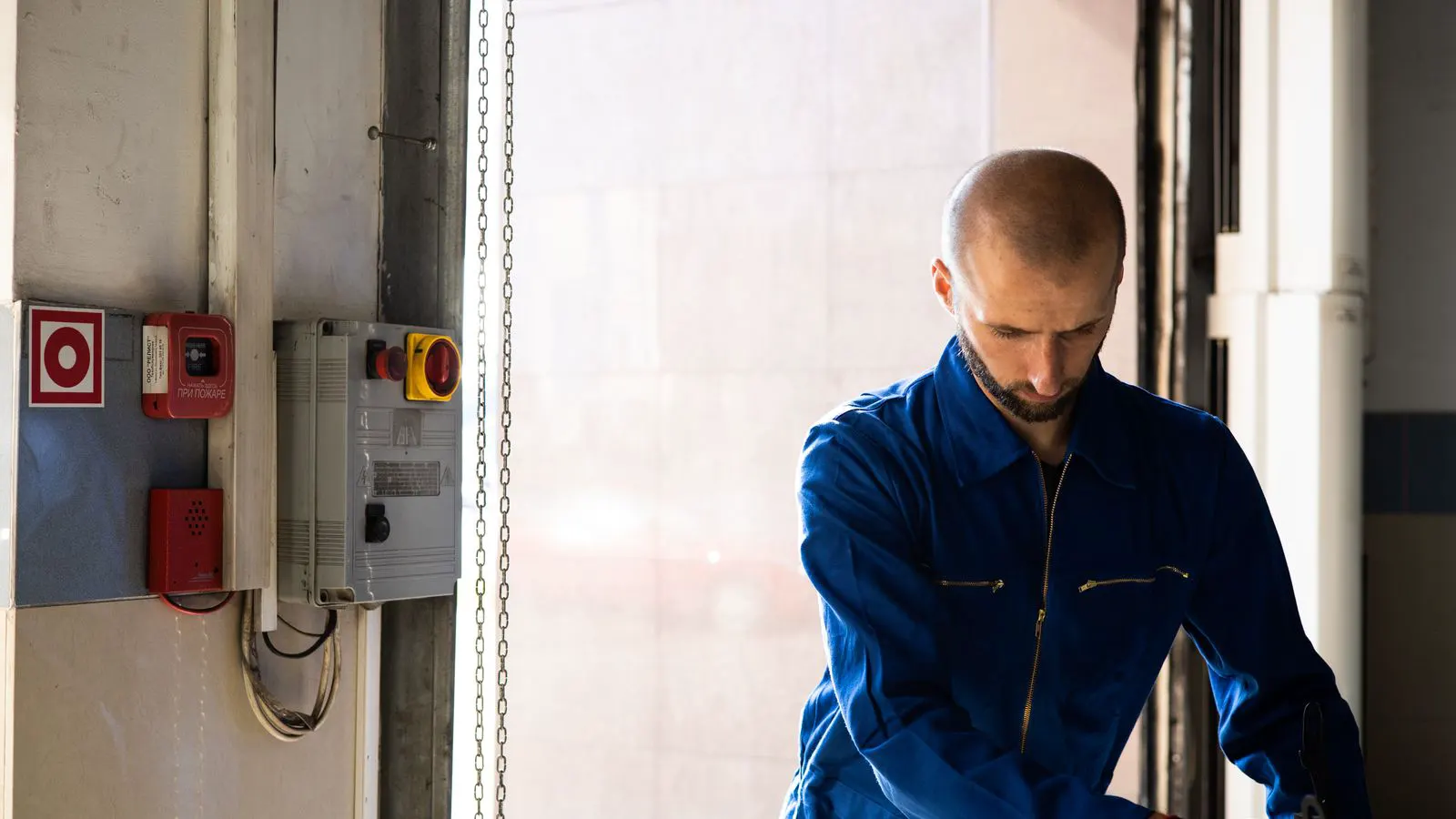 Technician inspecting a large industrial bearing assembly