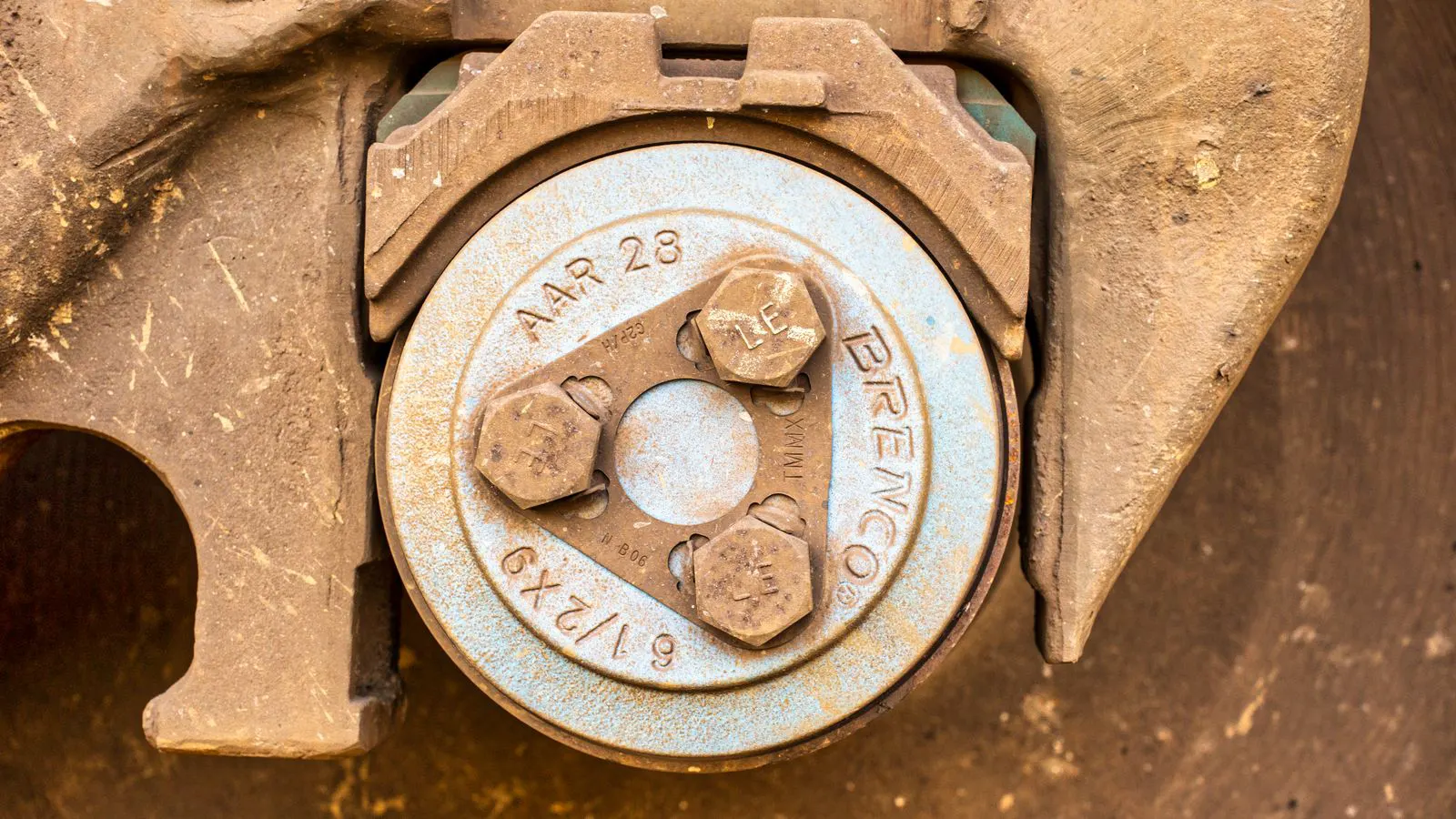Close up of a steel ball bearing installed in a motor housing