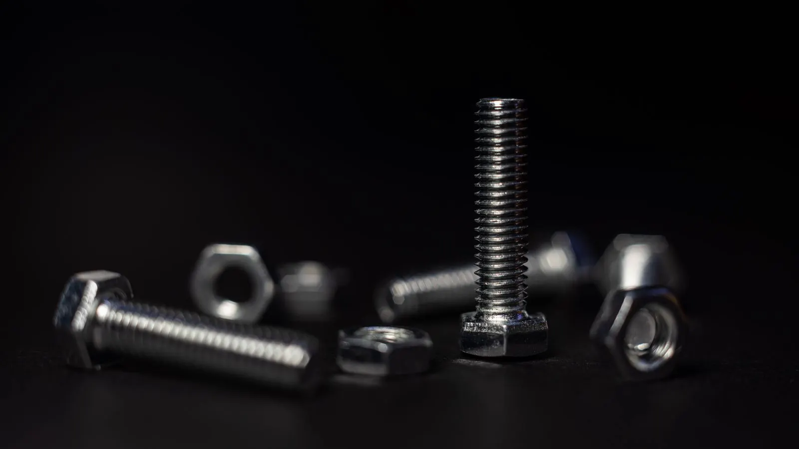 A precision ball screw assembly mounted in a linear motion machine.