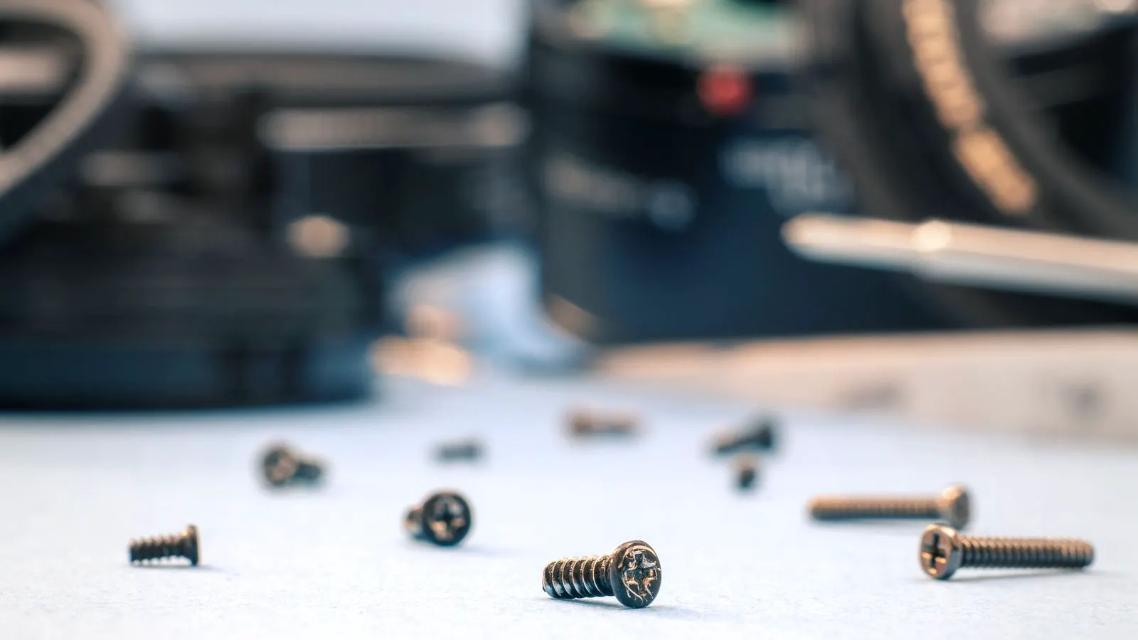 A torque wrench applied to a high-strength steel bolt head.