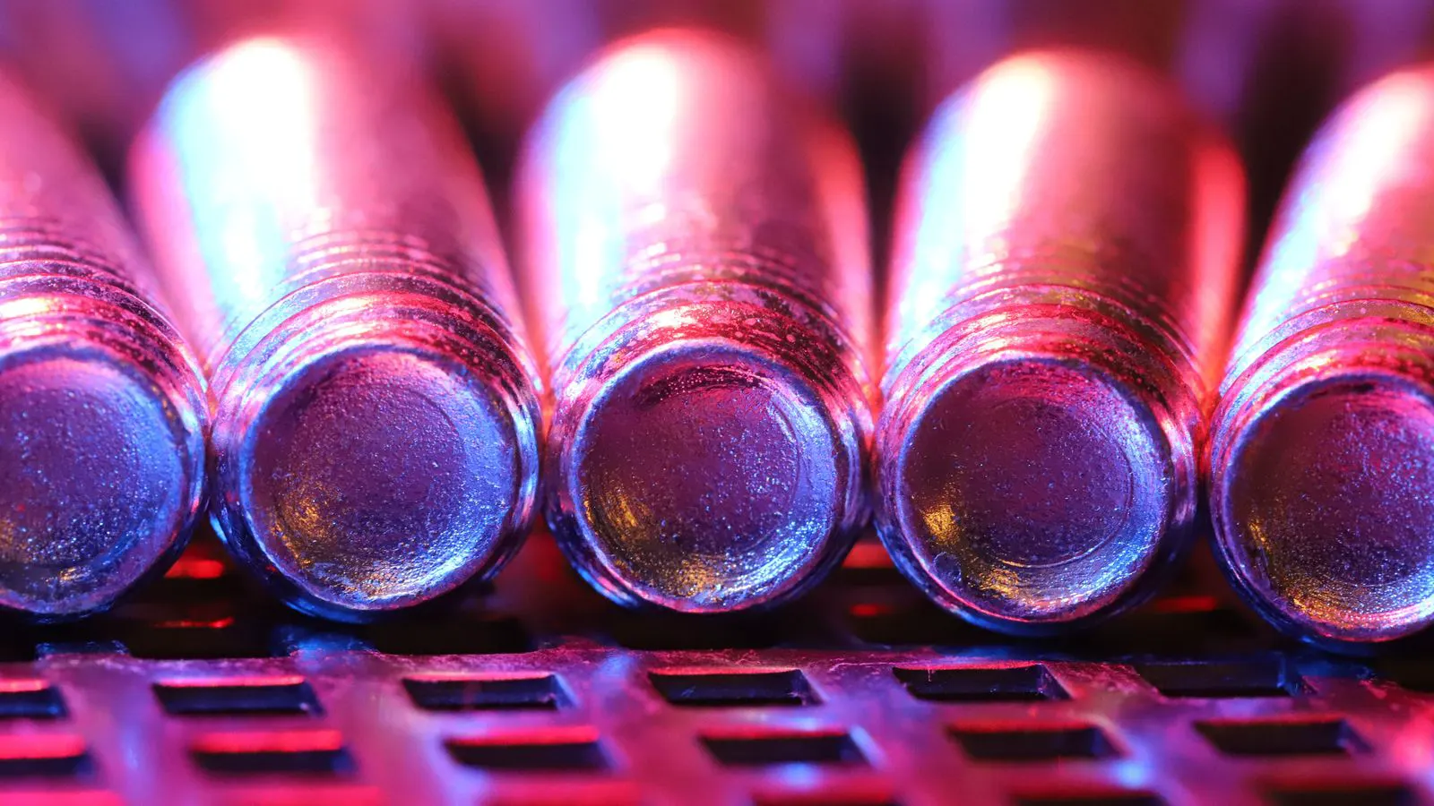 Industrial steel mill processing molten metal into ingots