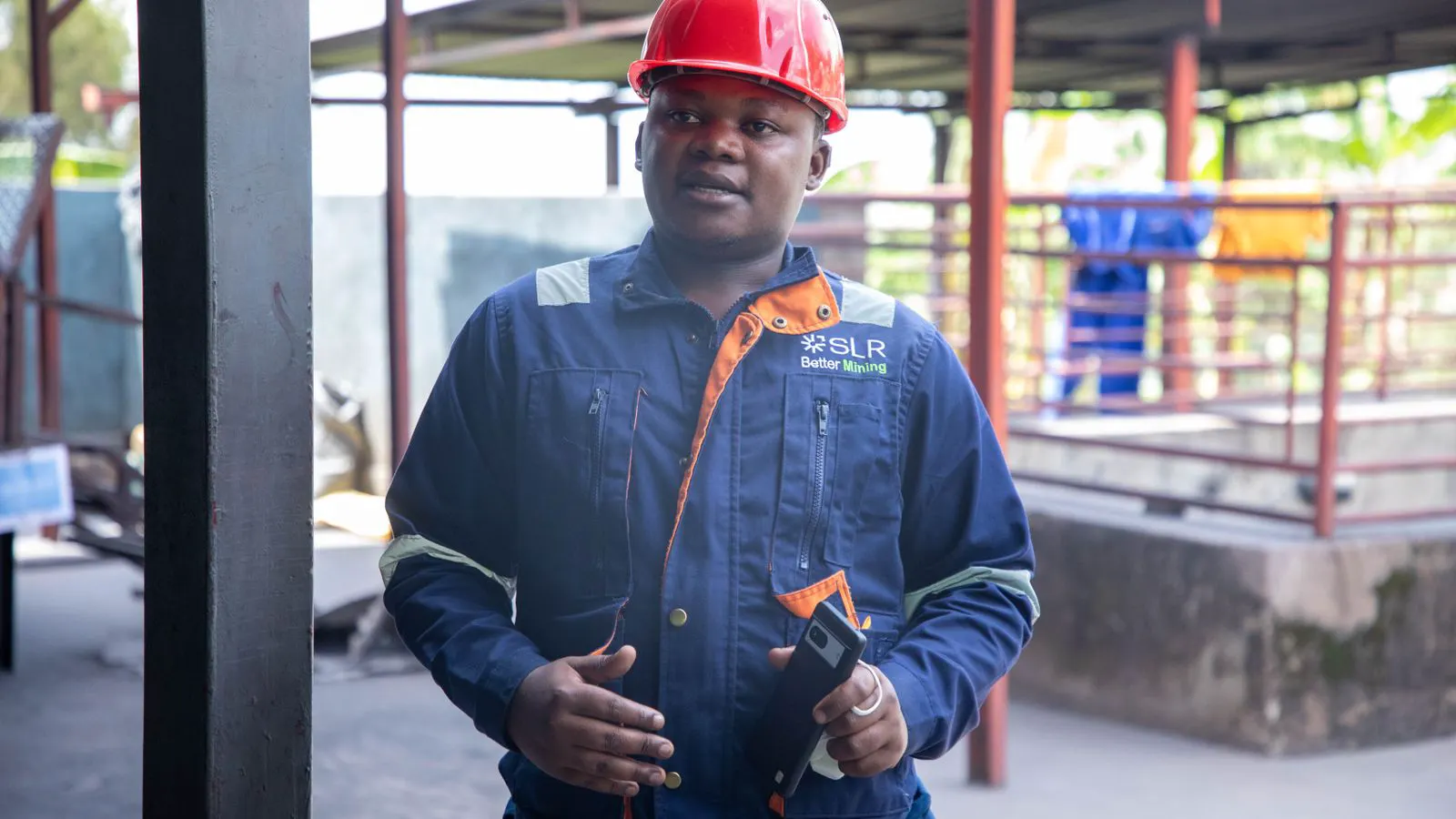 Engineer using portable hardness gauge on steel bolt