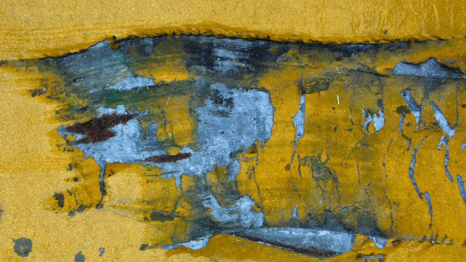 Industrial hex bolts showing flaking and peeling on the coating