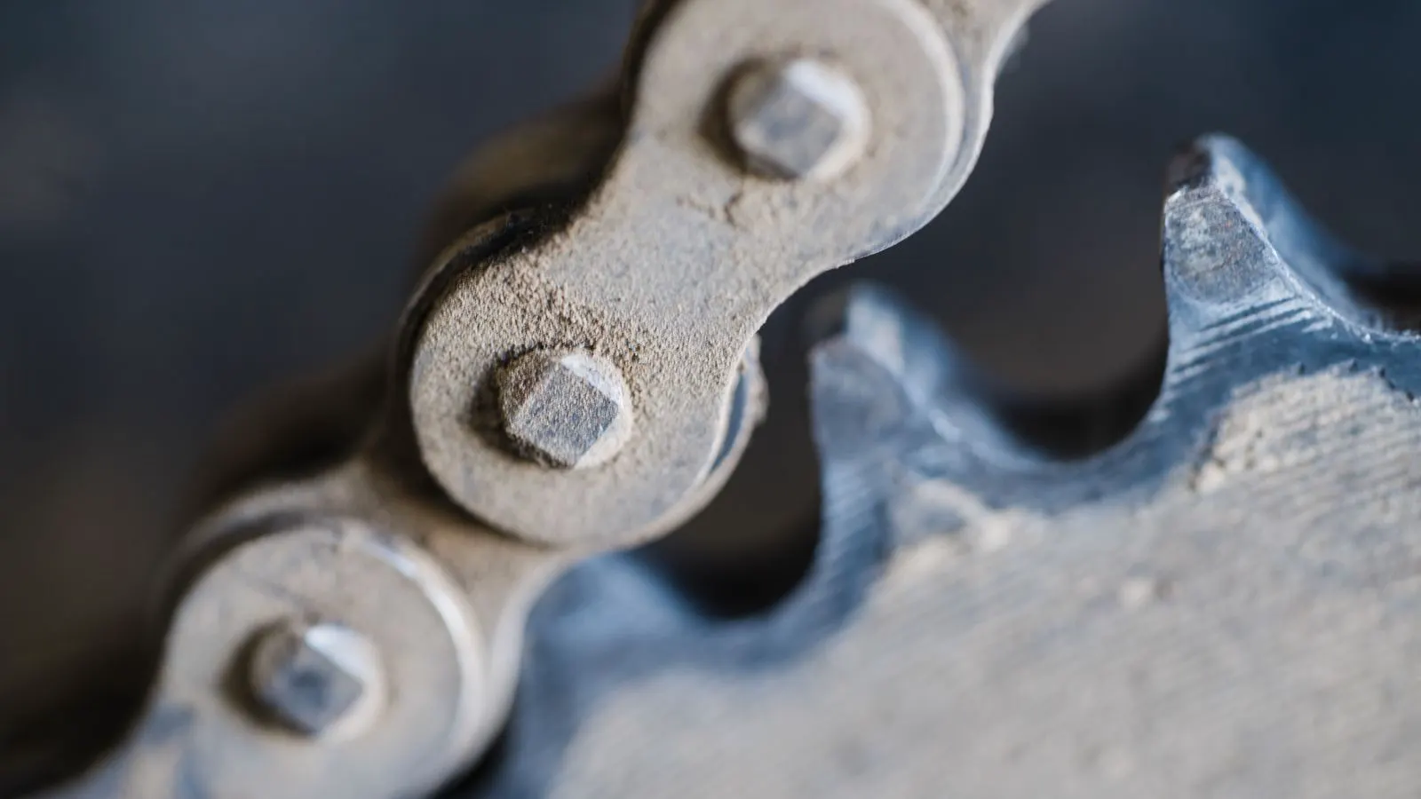 Close view of a steel bolt head with a printed tracking code label