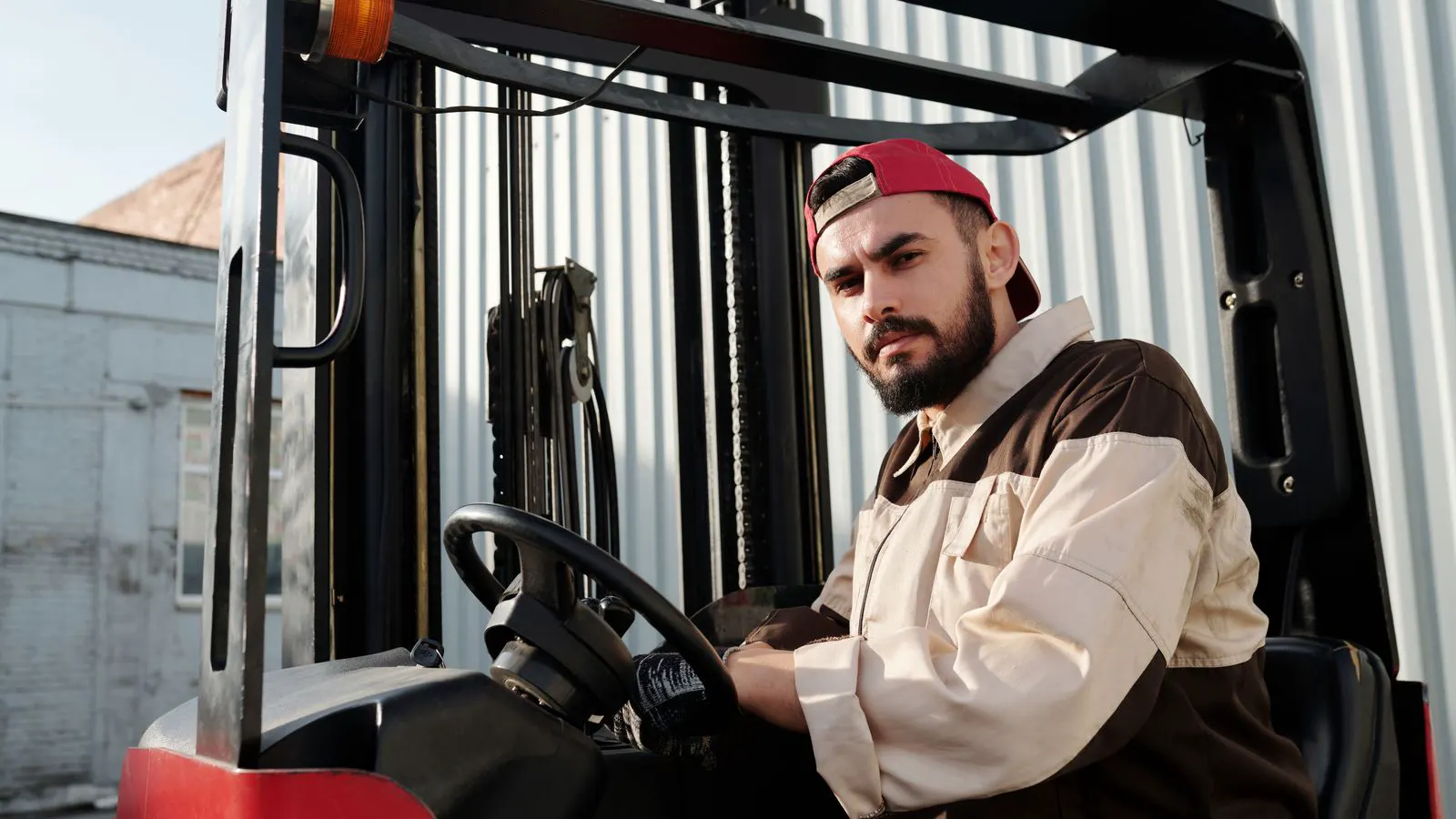 Heavy diesel forklift operating on an outdoor industrial yard
