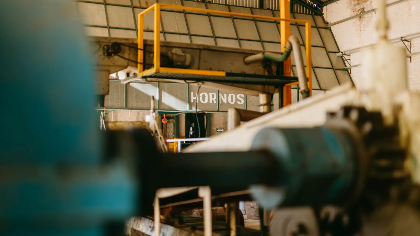 Steel rollers on a heavy load conveyor frame