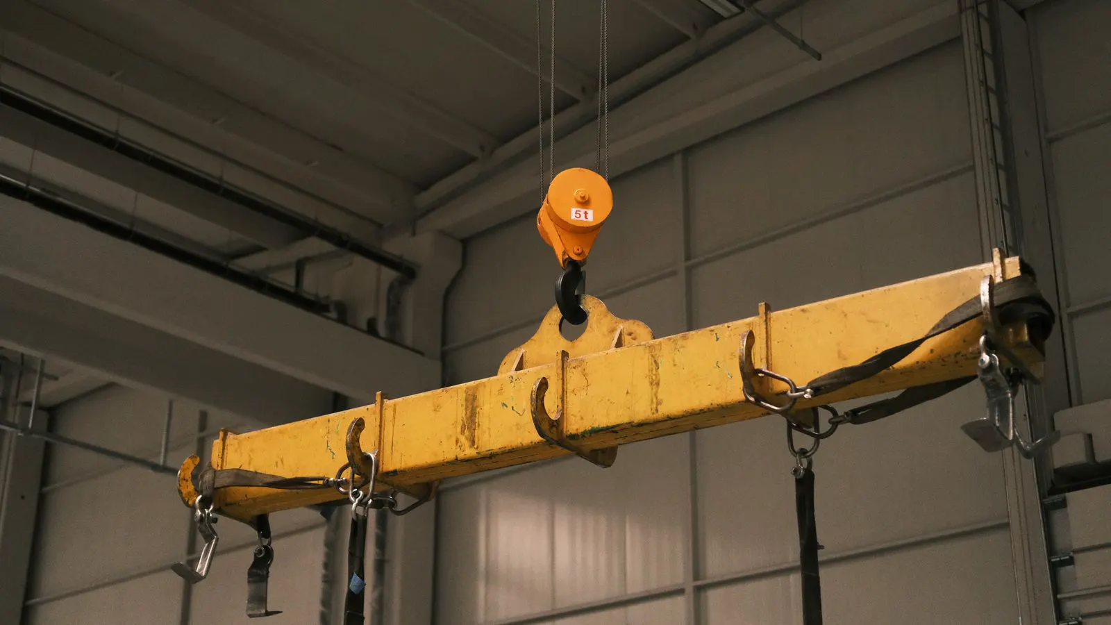 Close up view of mechanical safety devices on a crane rail
