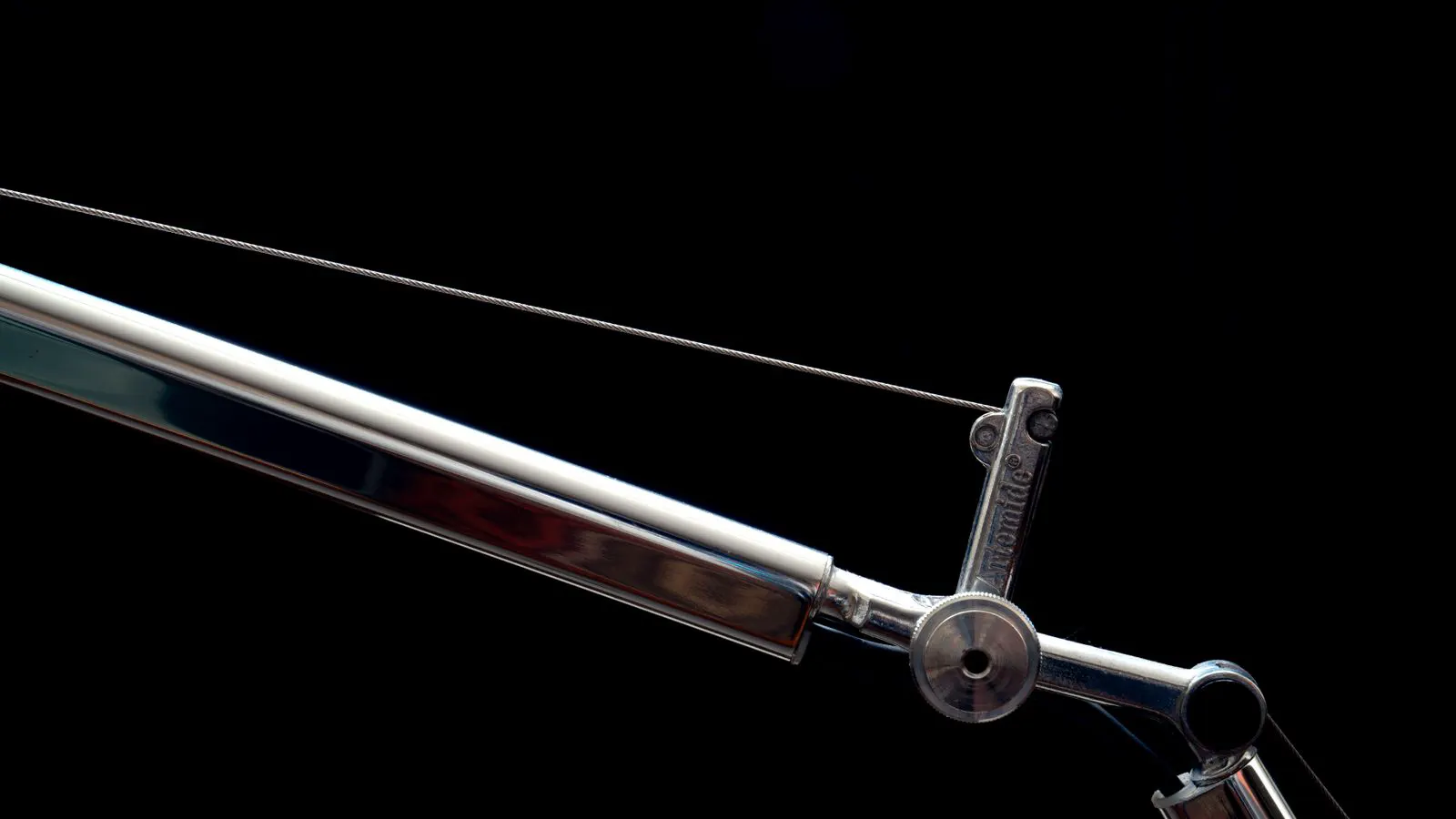 A high-resolution camera captures a defect on a coated metal surface.
