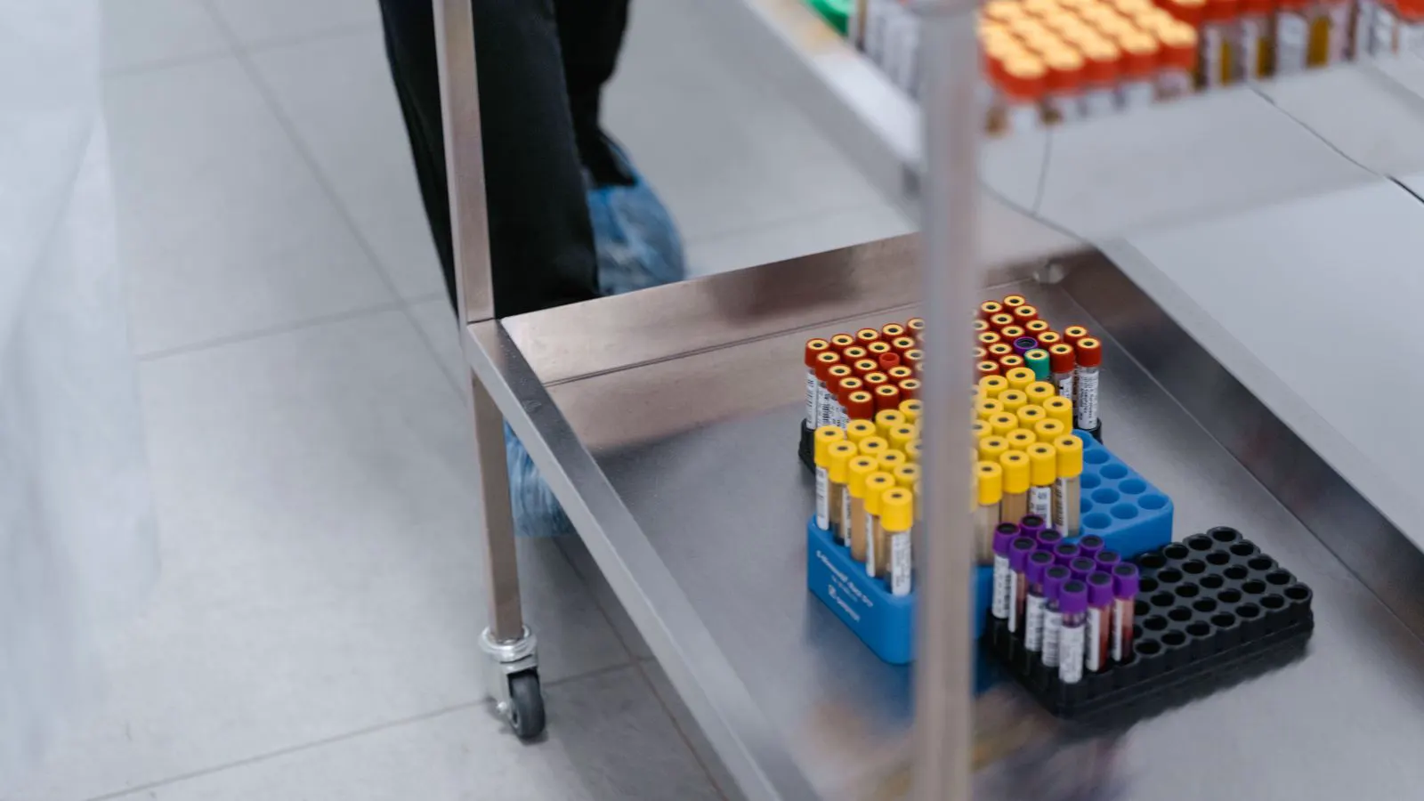 A close-up view of a metal sample being analyzed with a non-destructive testing device
