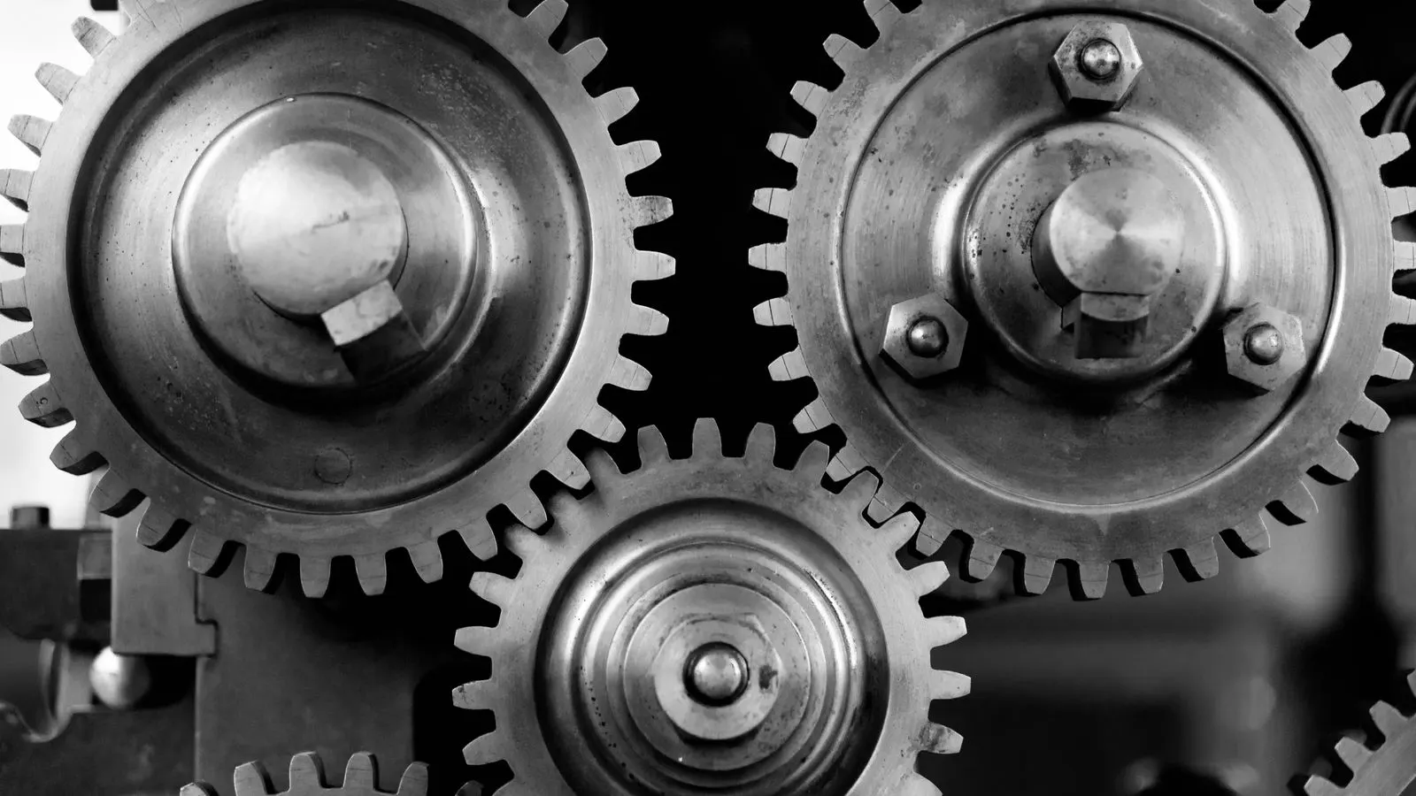 Industrial metal parts showing zinc and nickel plating finishes