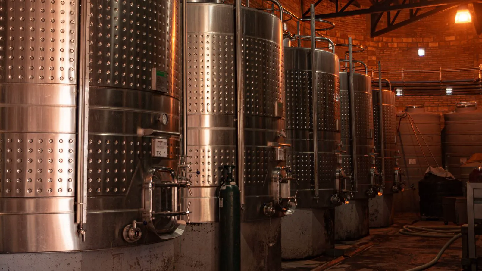 Stainless steel components sitting in a passivation chemical bath