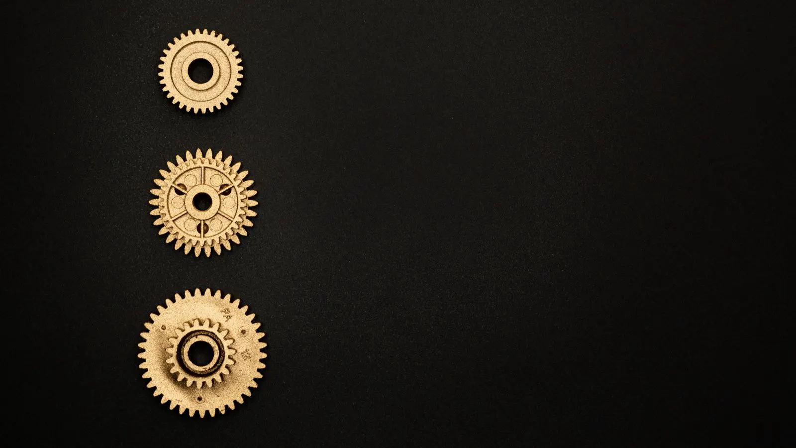 Close-up of black nickel plated metal screws and brackets