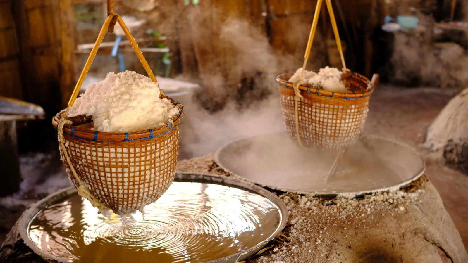 Stainless steel components undergoing salt spray testing in a chamber.