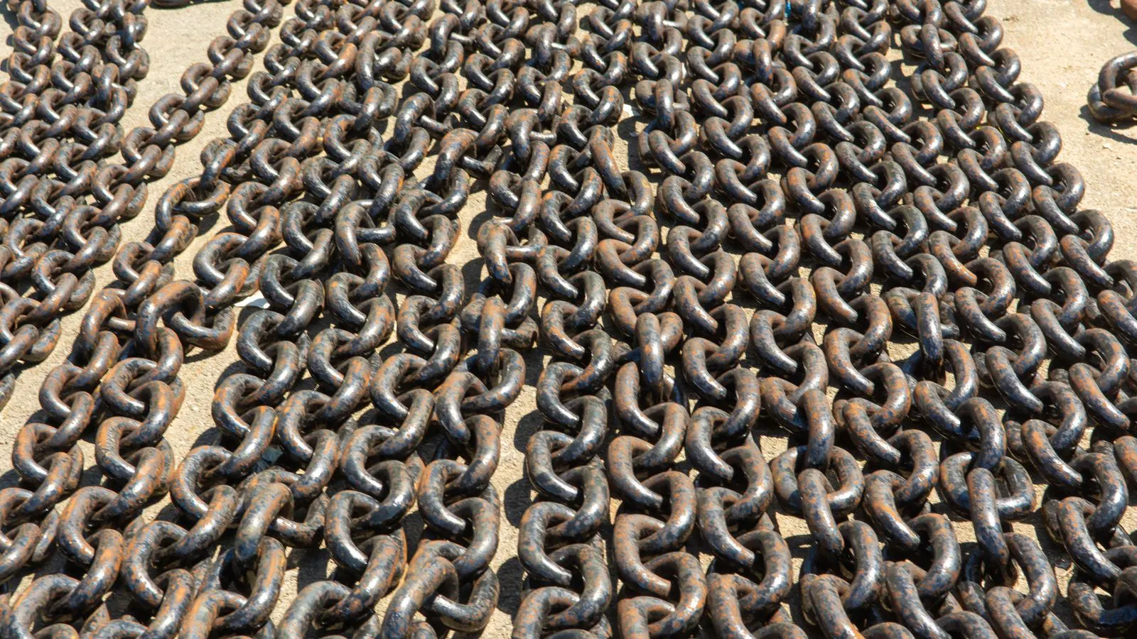 Close view of coated metal surfaces showing zinc coating texture.