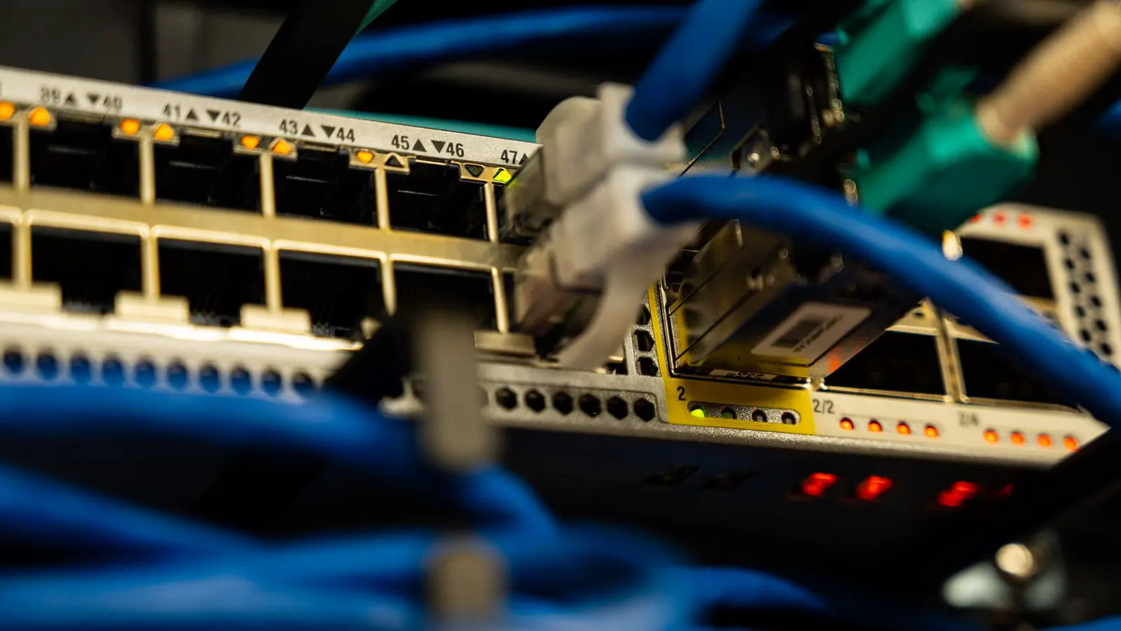 Industrial Ethernet switches mounted on a wall panel