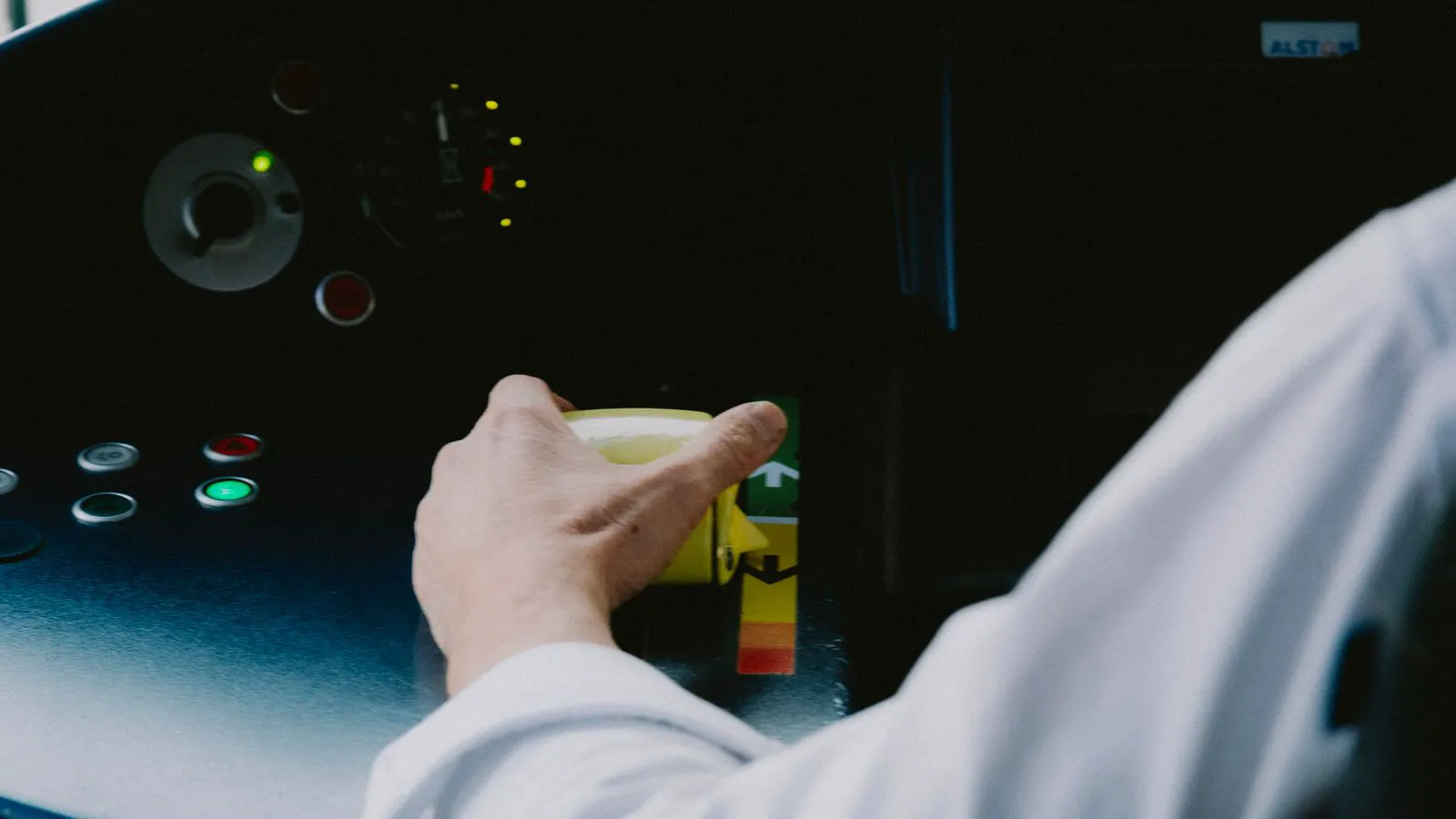 A close-up view of a factory control room dashboard displaying machine status.