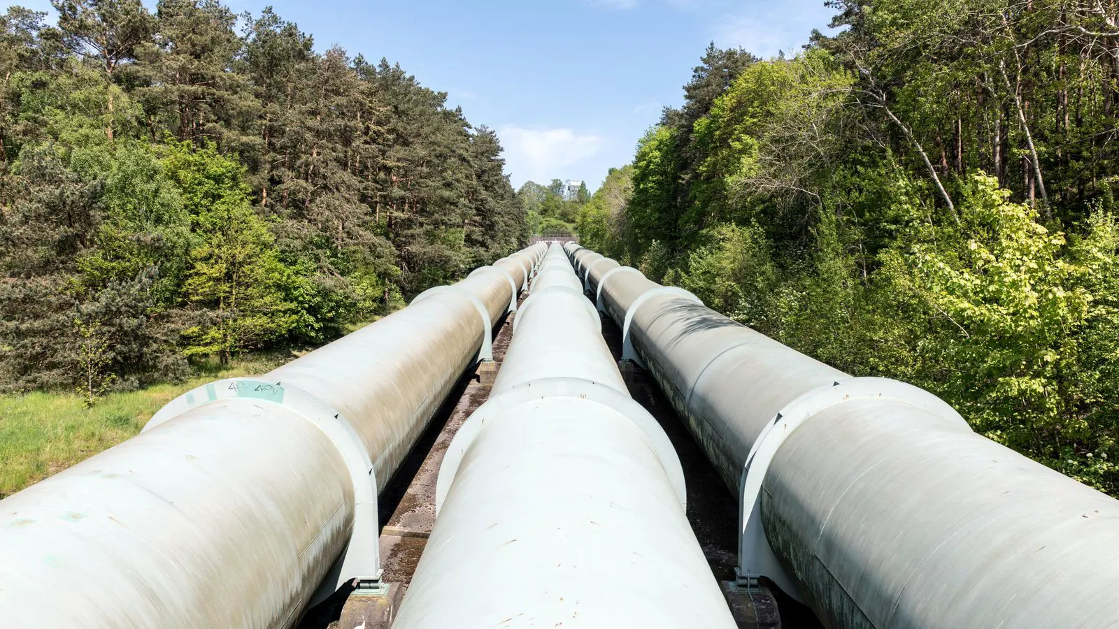 A close-up view of a sensor installed in an industrial pipe