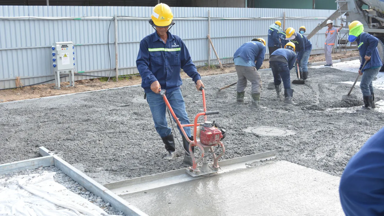 A concrete pad prepared for a new generator set installation.