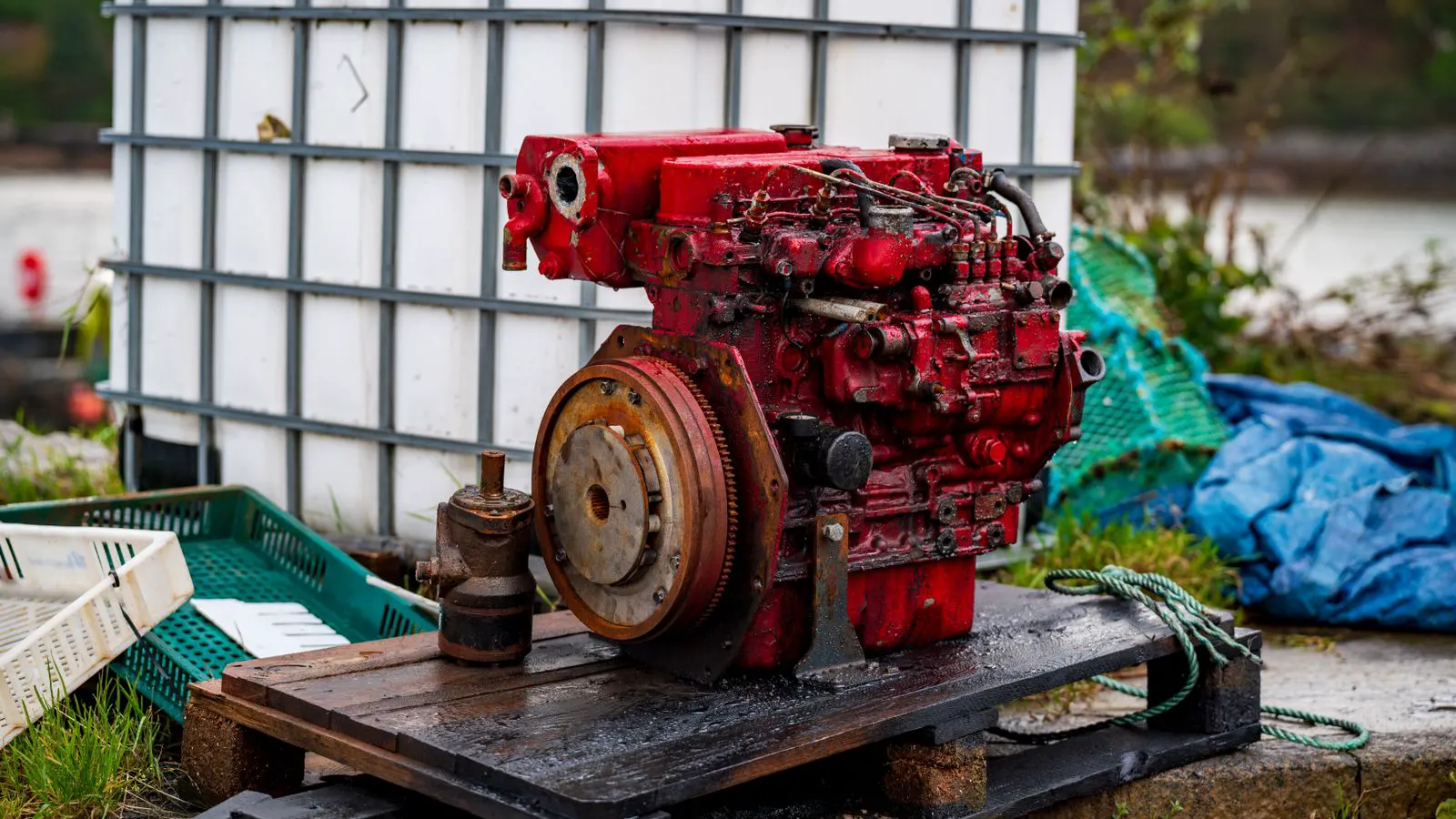 A large diesel generator unit installed in an industrial facility