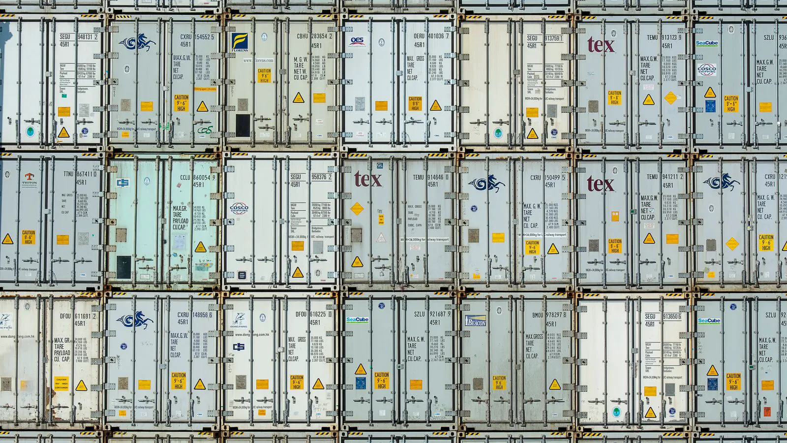A compact industrial power supply unit mounted on a DIN rail