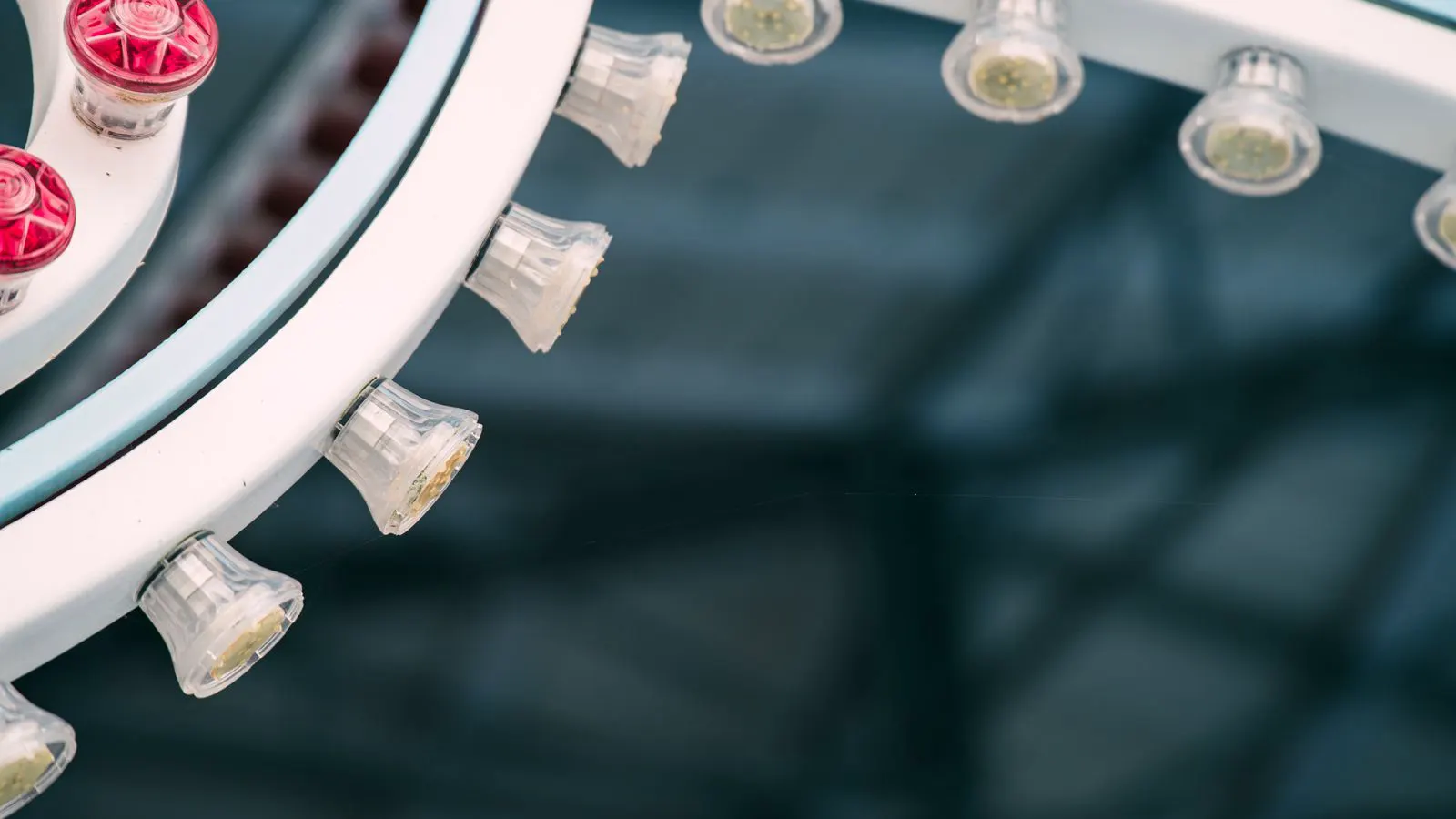 Rows of LED driver components stored on metal shelving in a warehouse