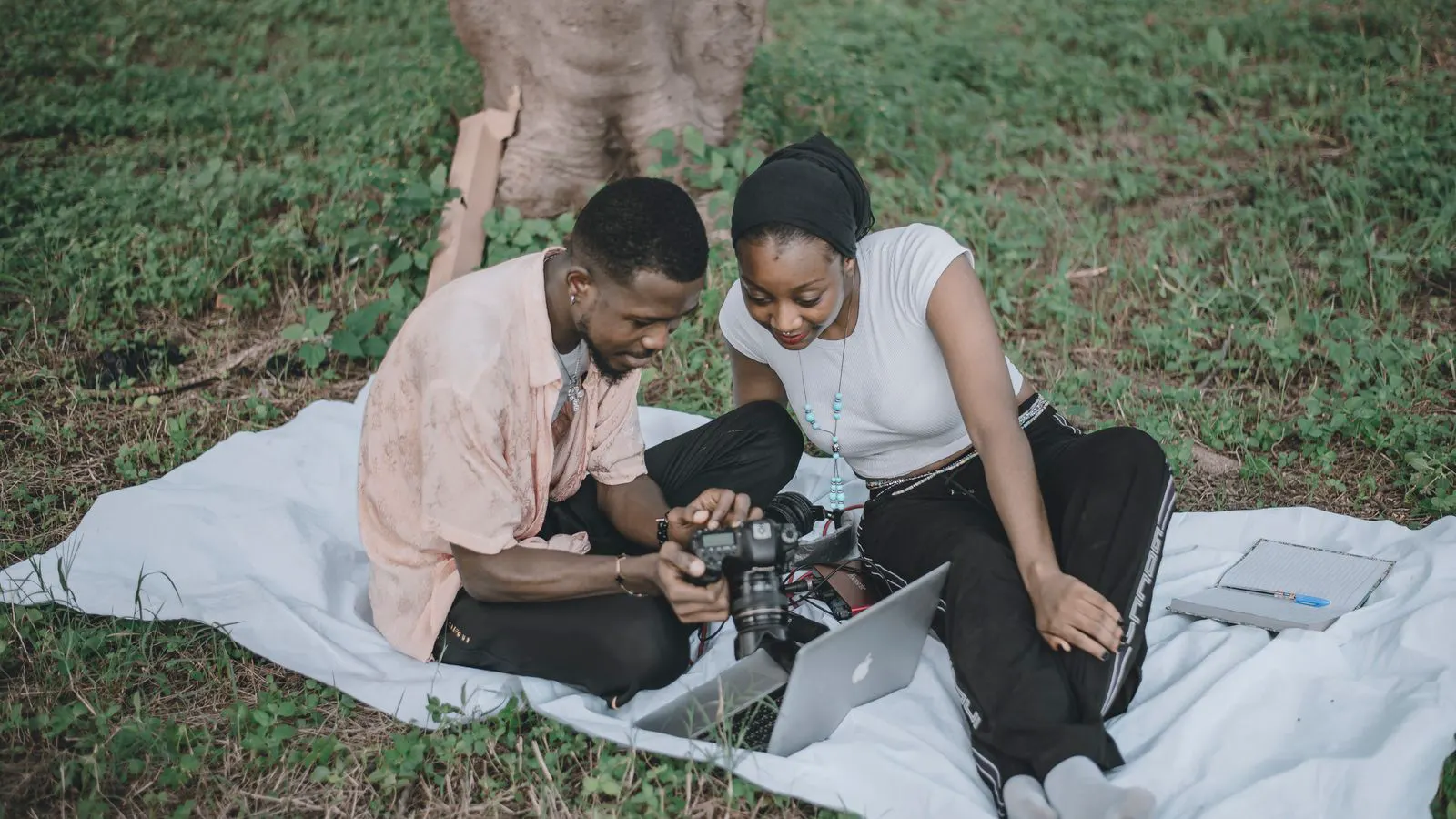 Engineers and project managers reviewing camera specifications at a work table