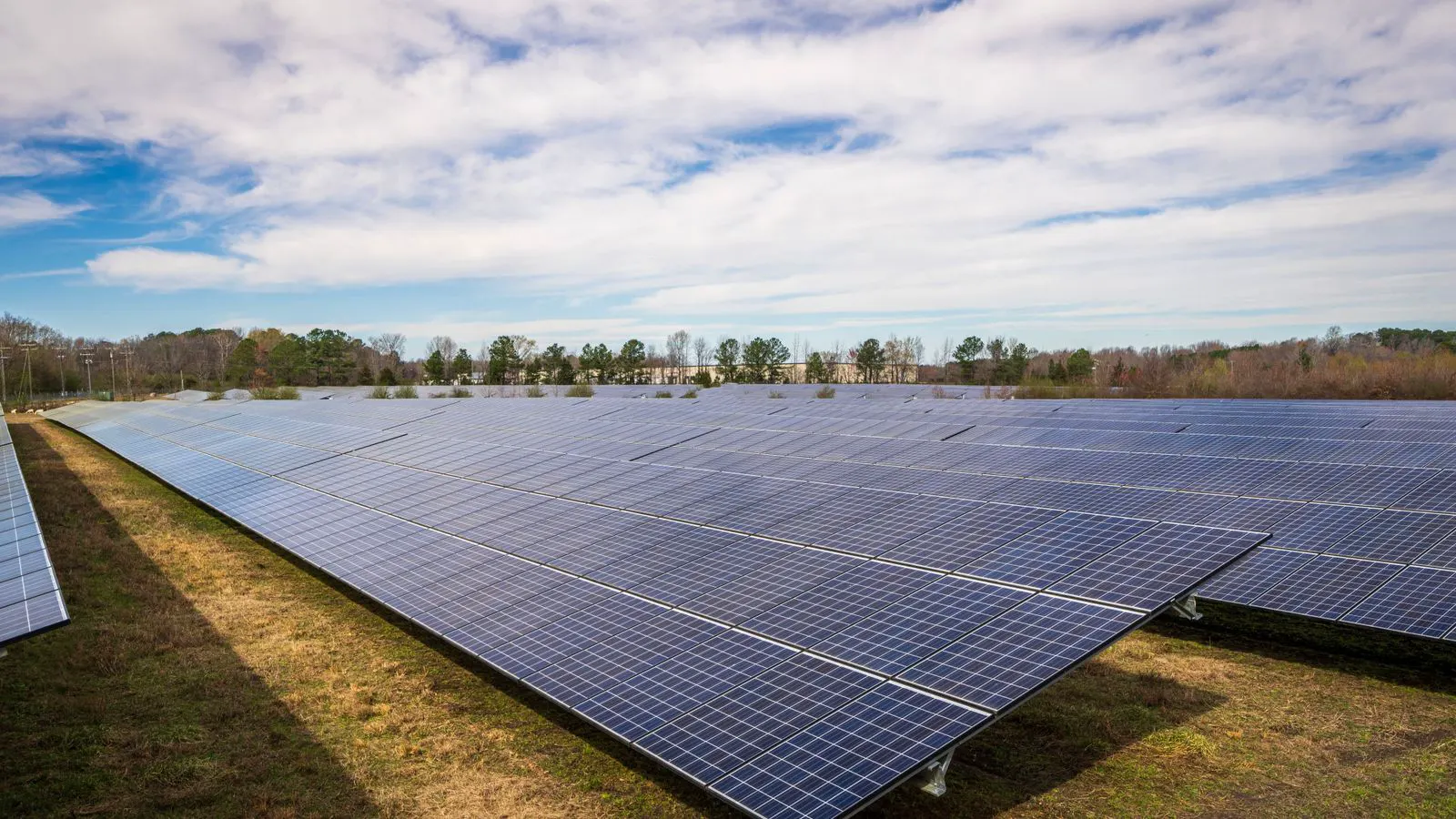 Rooftop solar panels and an inverter unit installed on a commercial building