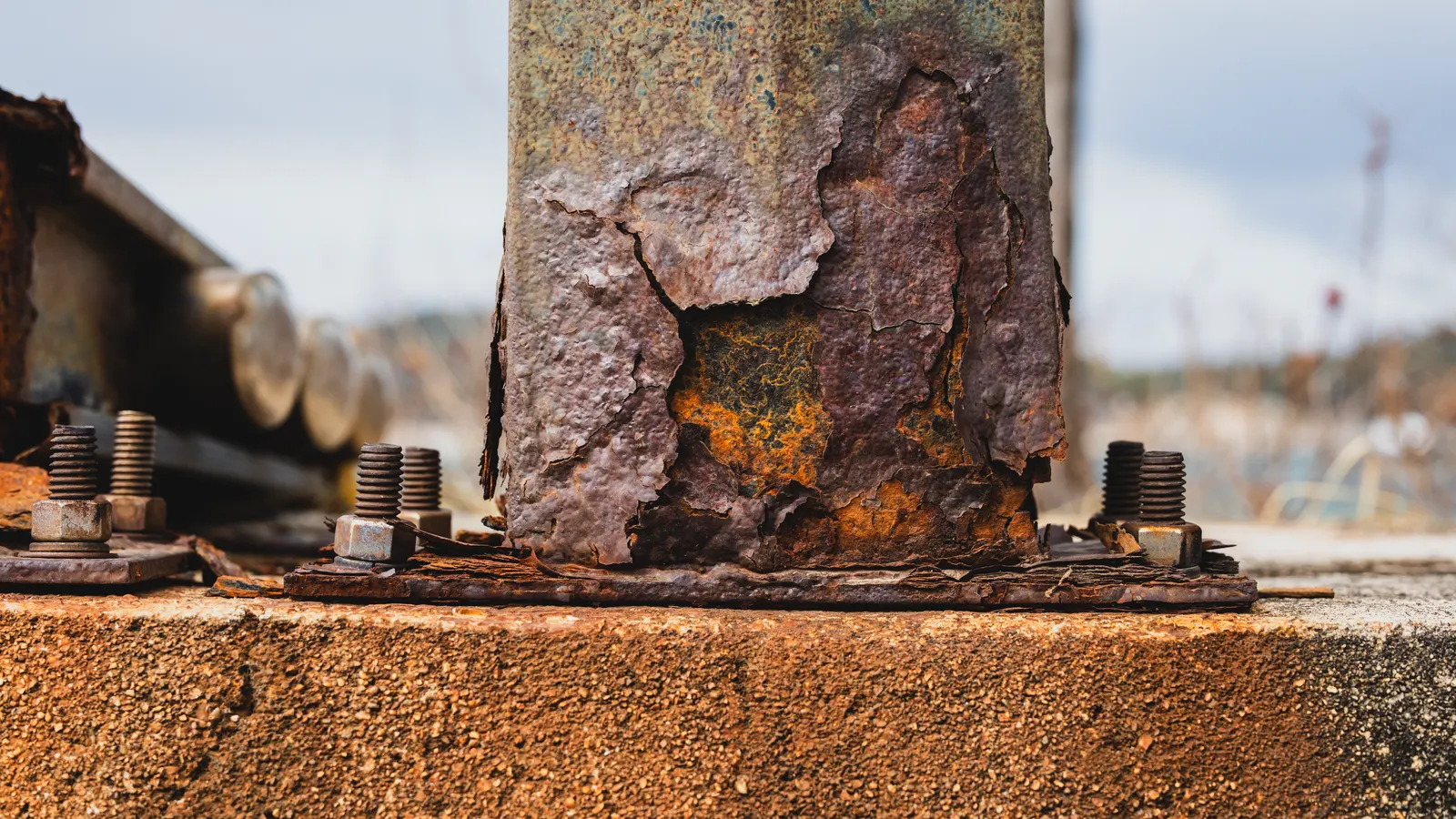 Close up of rusted steel racking frame with visible corrosion
