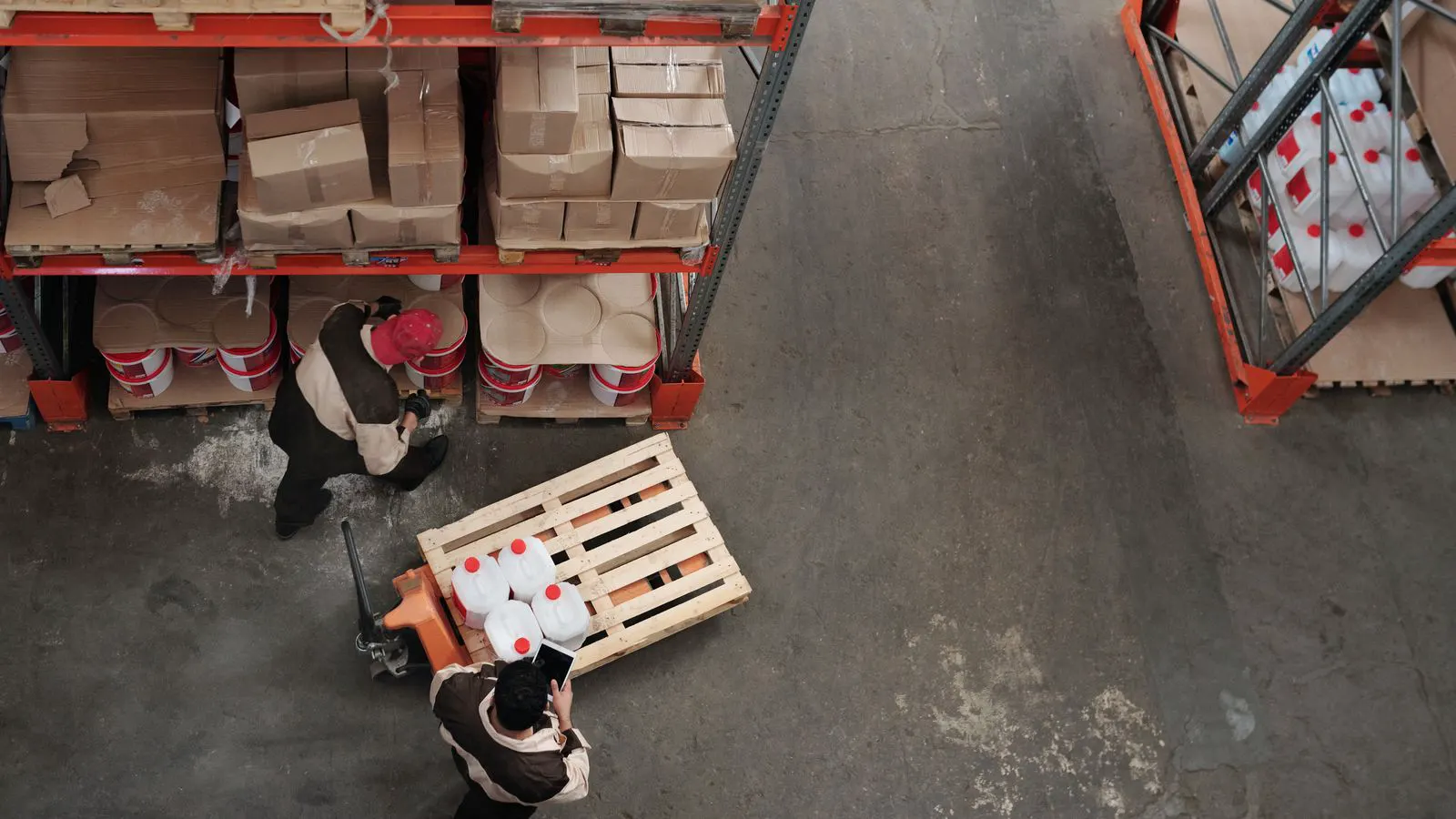 Workers checking battery modules on a production line