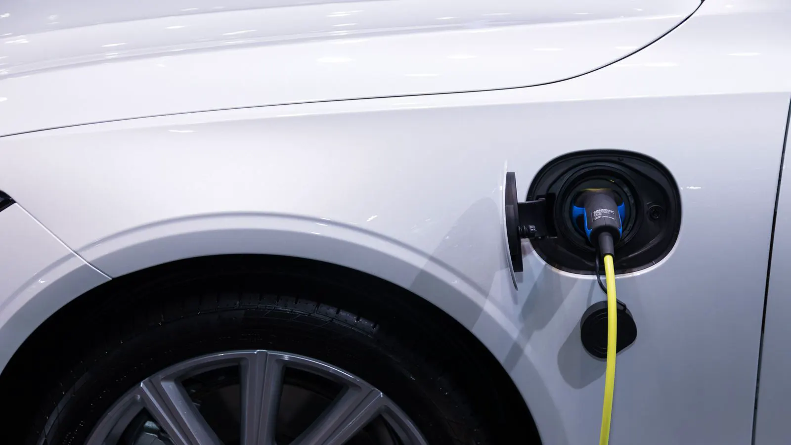 A digital dashboard displaying multiple EV charging stations and fleet status.
