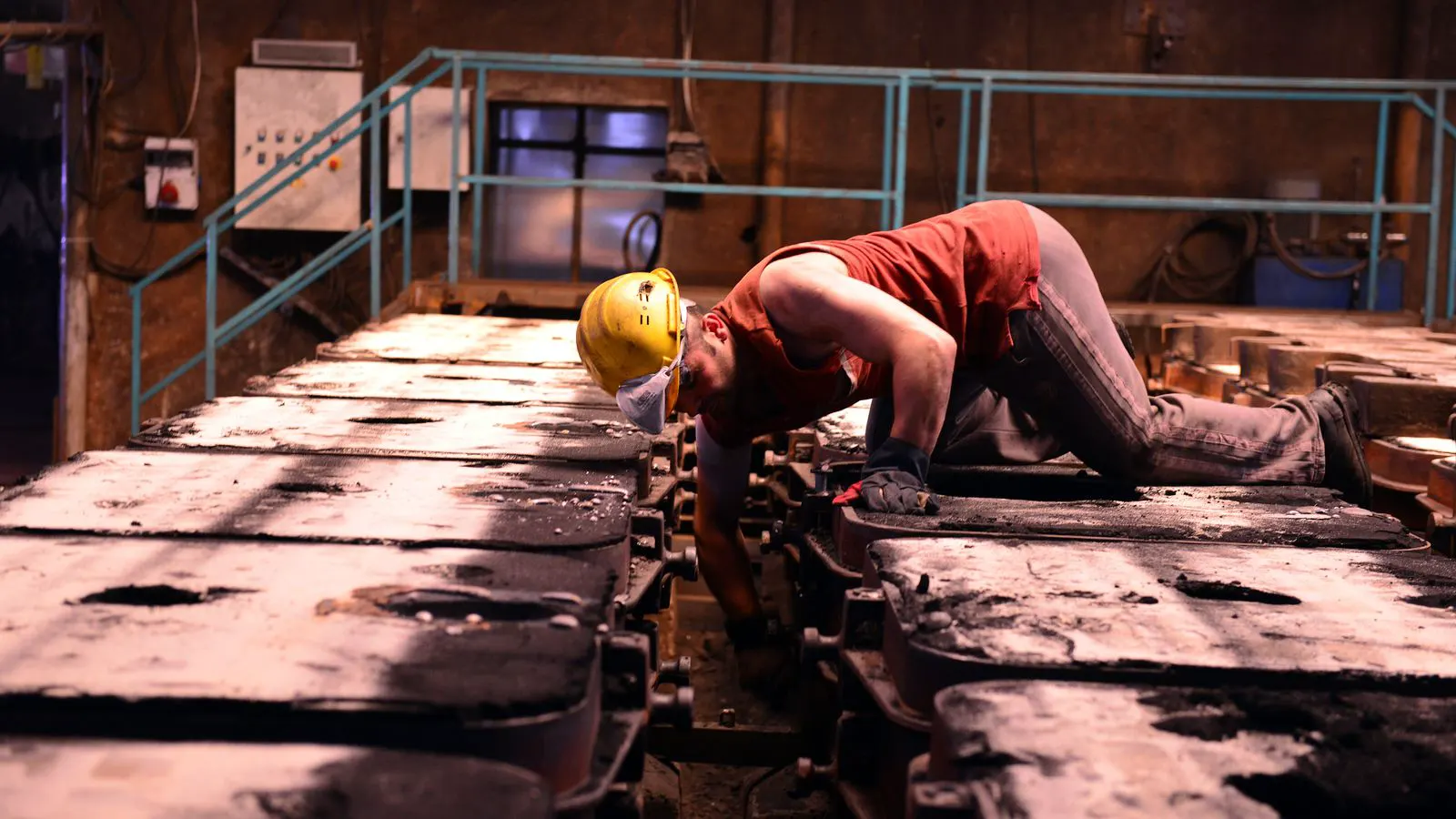 Engineer checking a filtration system in a clean industrial setting