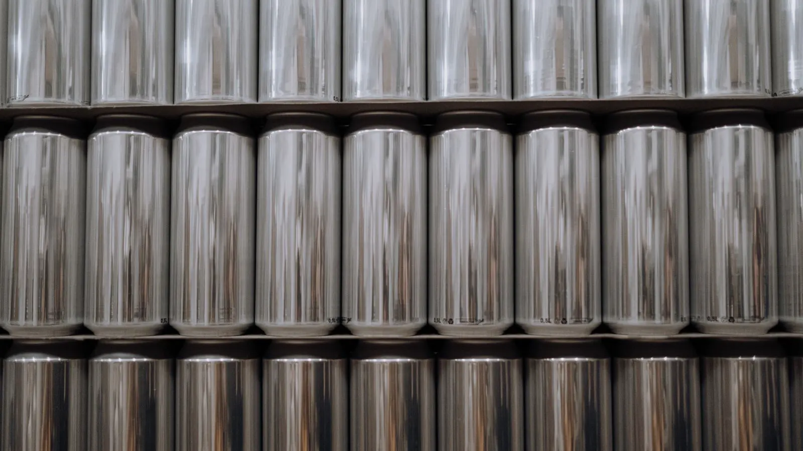 Industrial rollers shaping steel sheets in a manufacturing facility