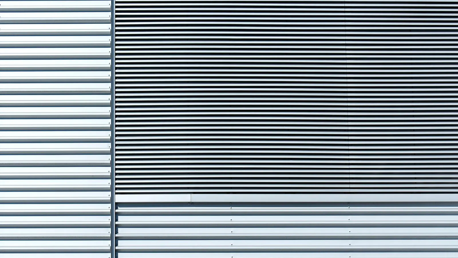 A close-up view of a hollow aluminum extrusion profile cross section
