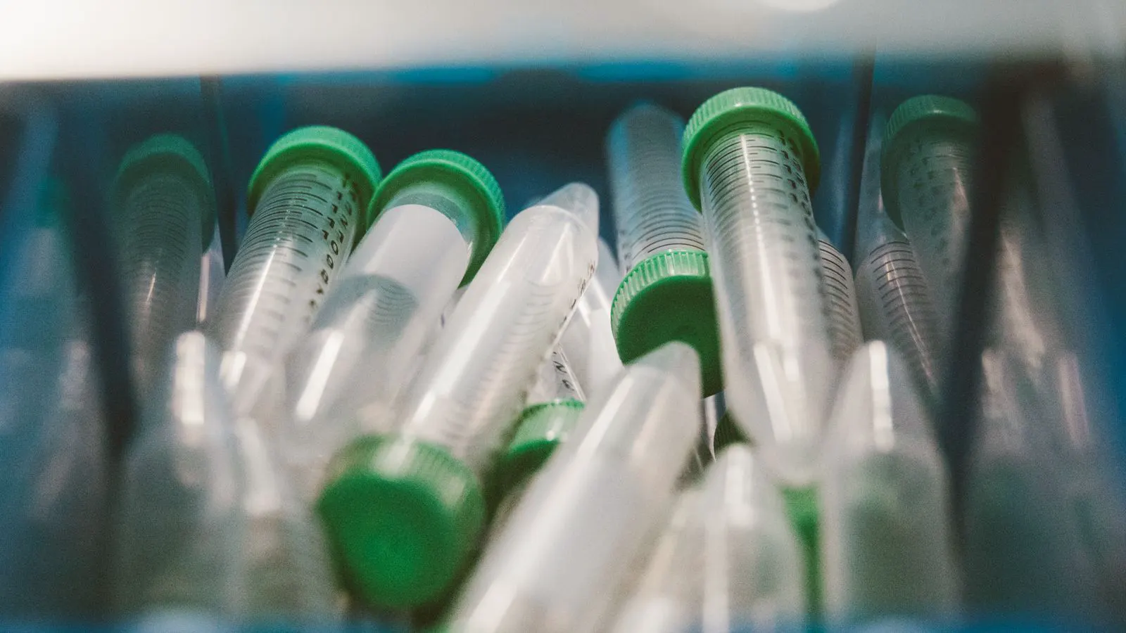 A sample of plastic resin pellets sitting on a laboratory test bench.