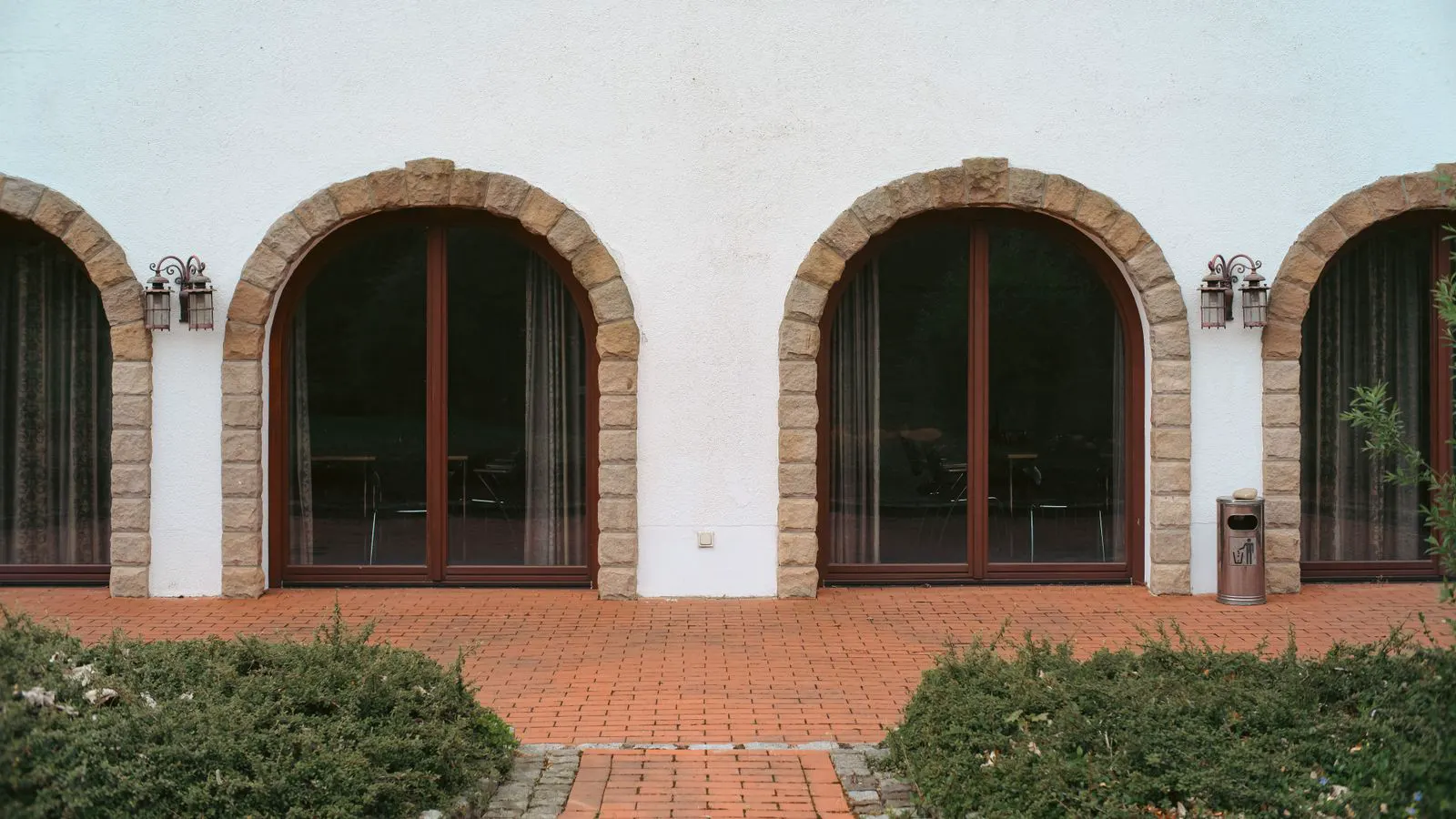 Close view of a sealed architectural window frame showing a cured sealant bead.