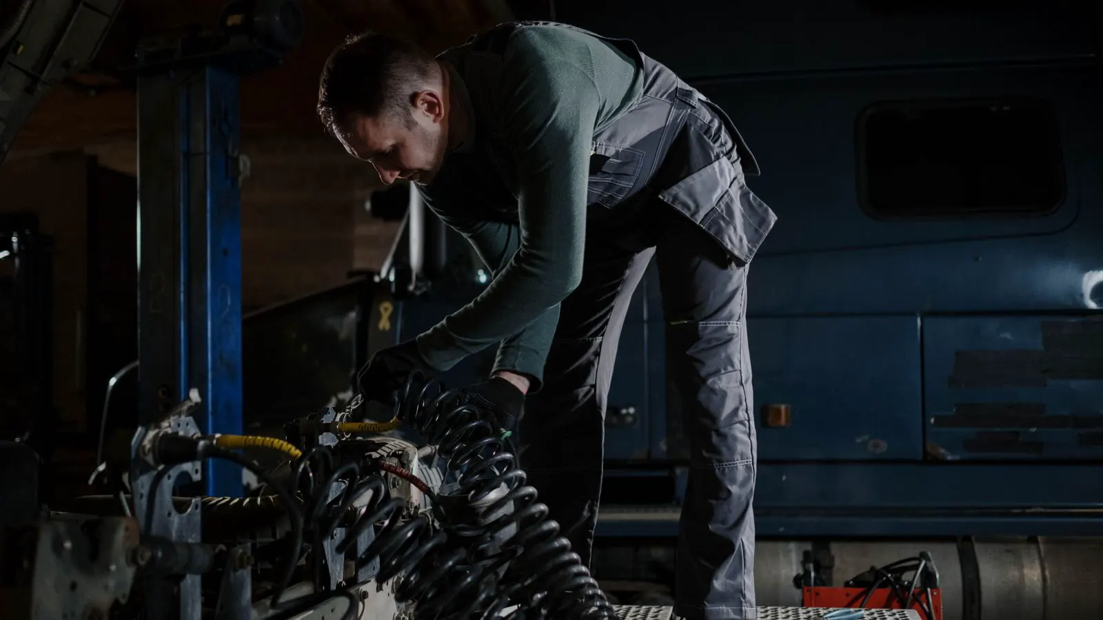 Engineer checking a fiberglass composite joint for delamination