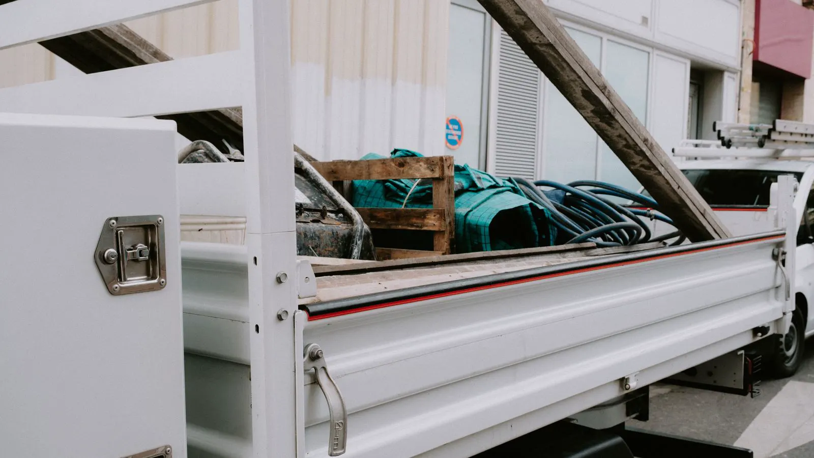 Finished modular building units loaded on a flatbed truck ready for transport