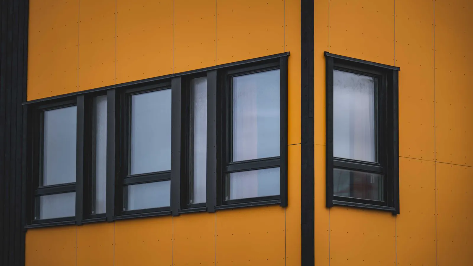 A close up of a white uPVC window frame with multi pane glass