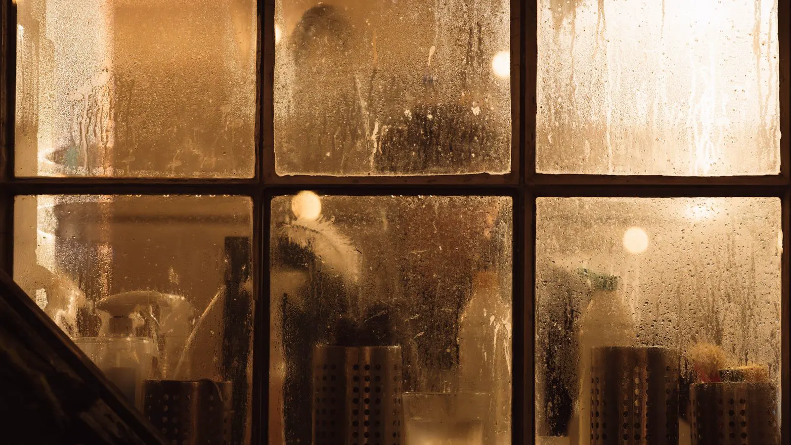 Moisture trapped between two panes of glass in a window frame