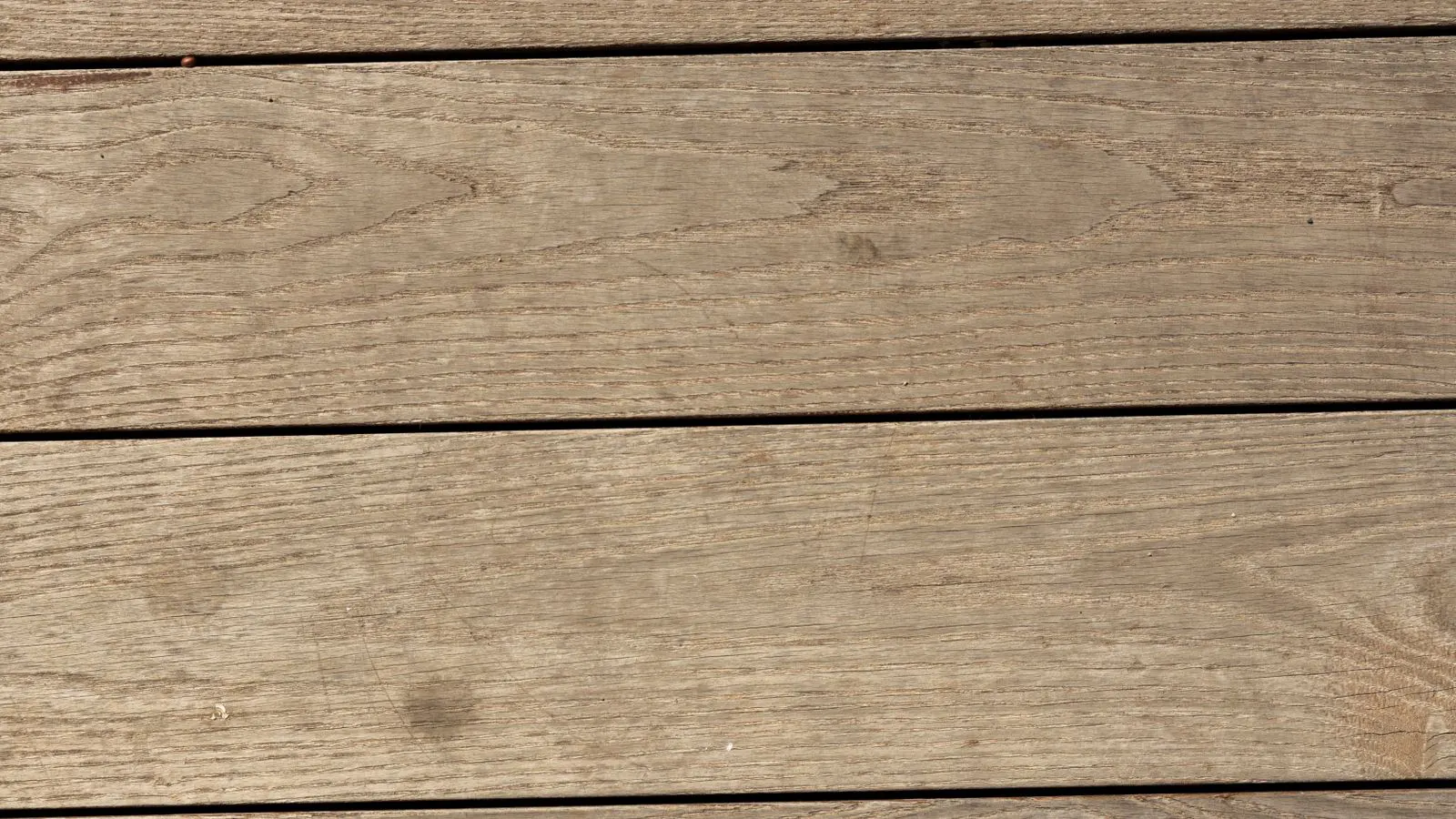 Cross section of a vinyl plank showing multiple material layers