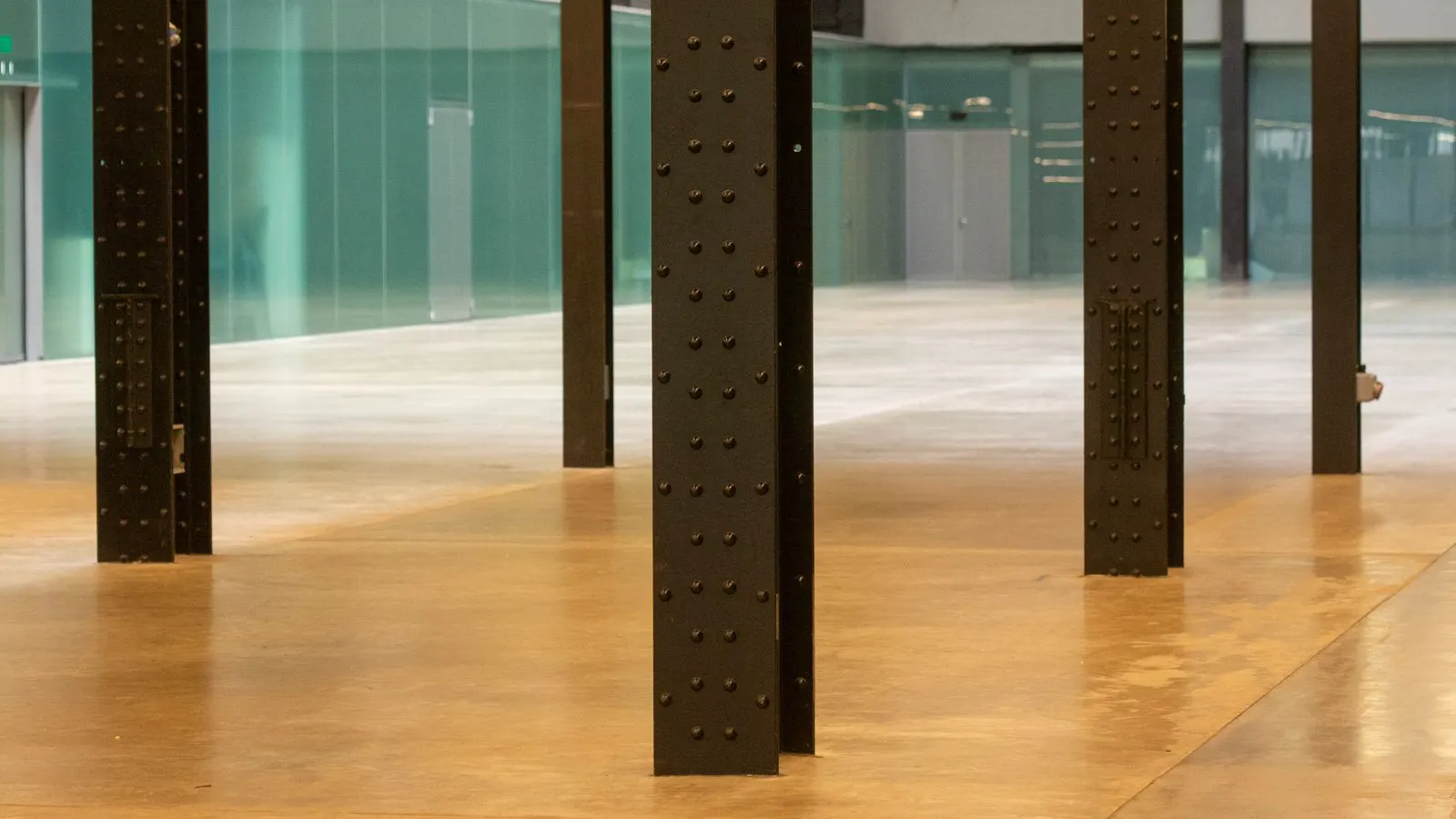 A dense matte porcelain tile installed in a busy walkway