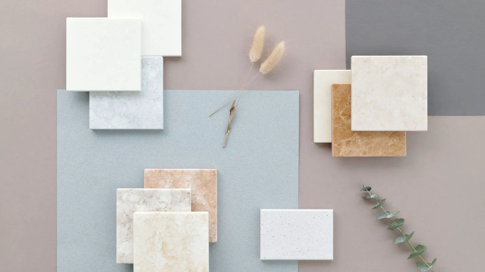 Close view of two ceramic tiles showing surface and edge quality differences