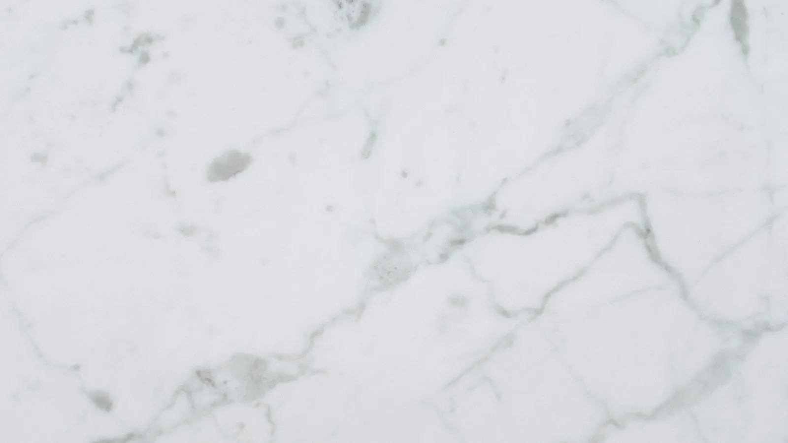 Natural stone slabs stacked for visual quality inspection
