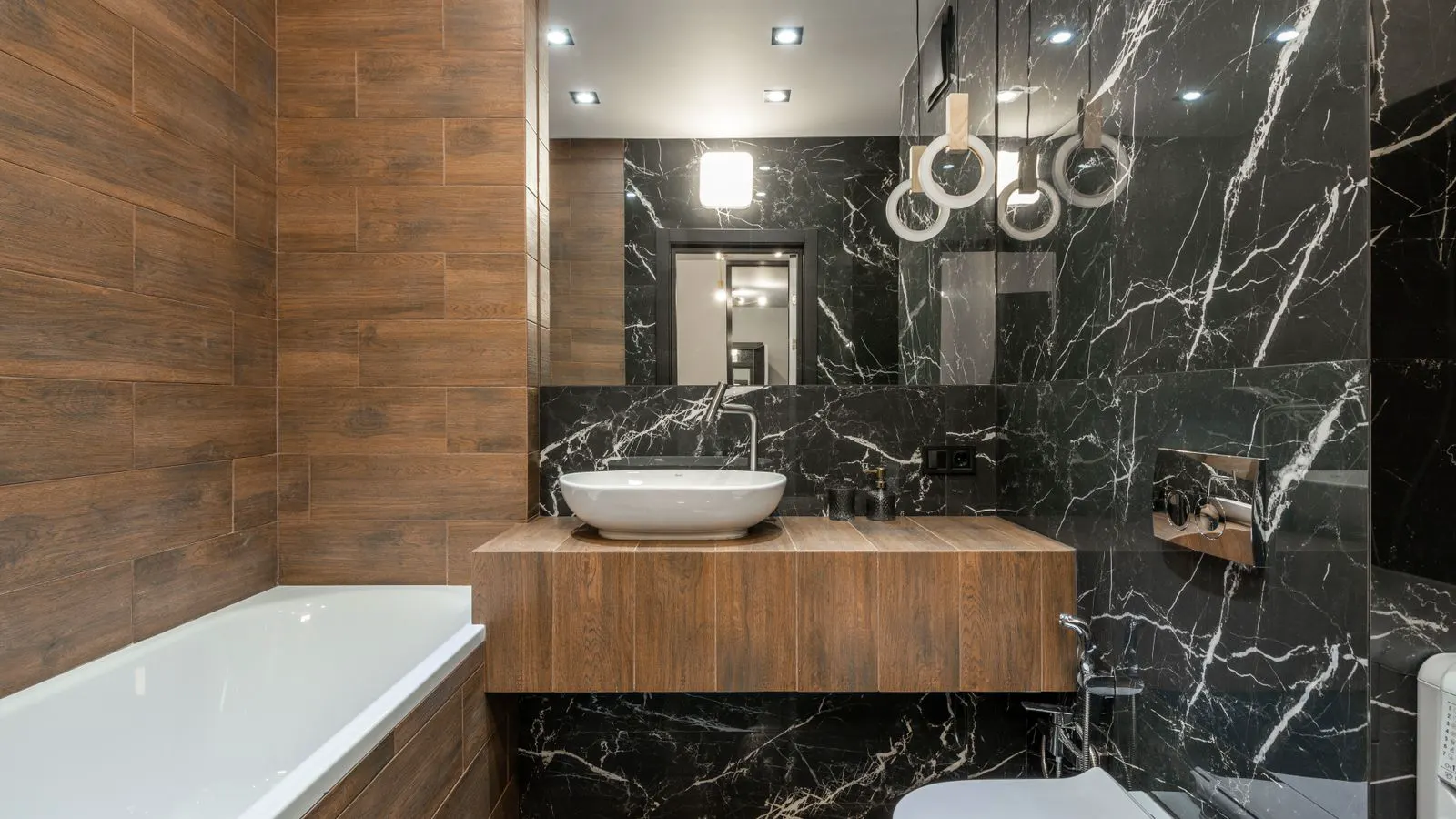 Close view of textured bathtub surfaces showing material differences