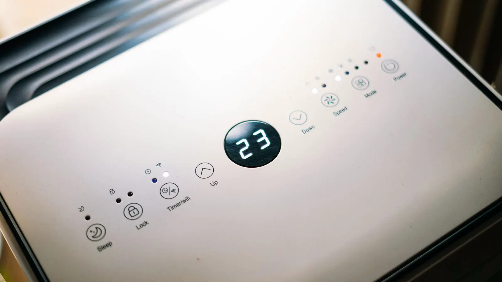 A close up of a digital display showing temperature settings on a control unit