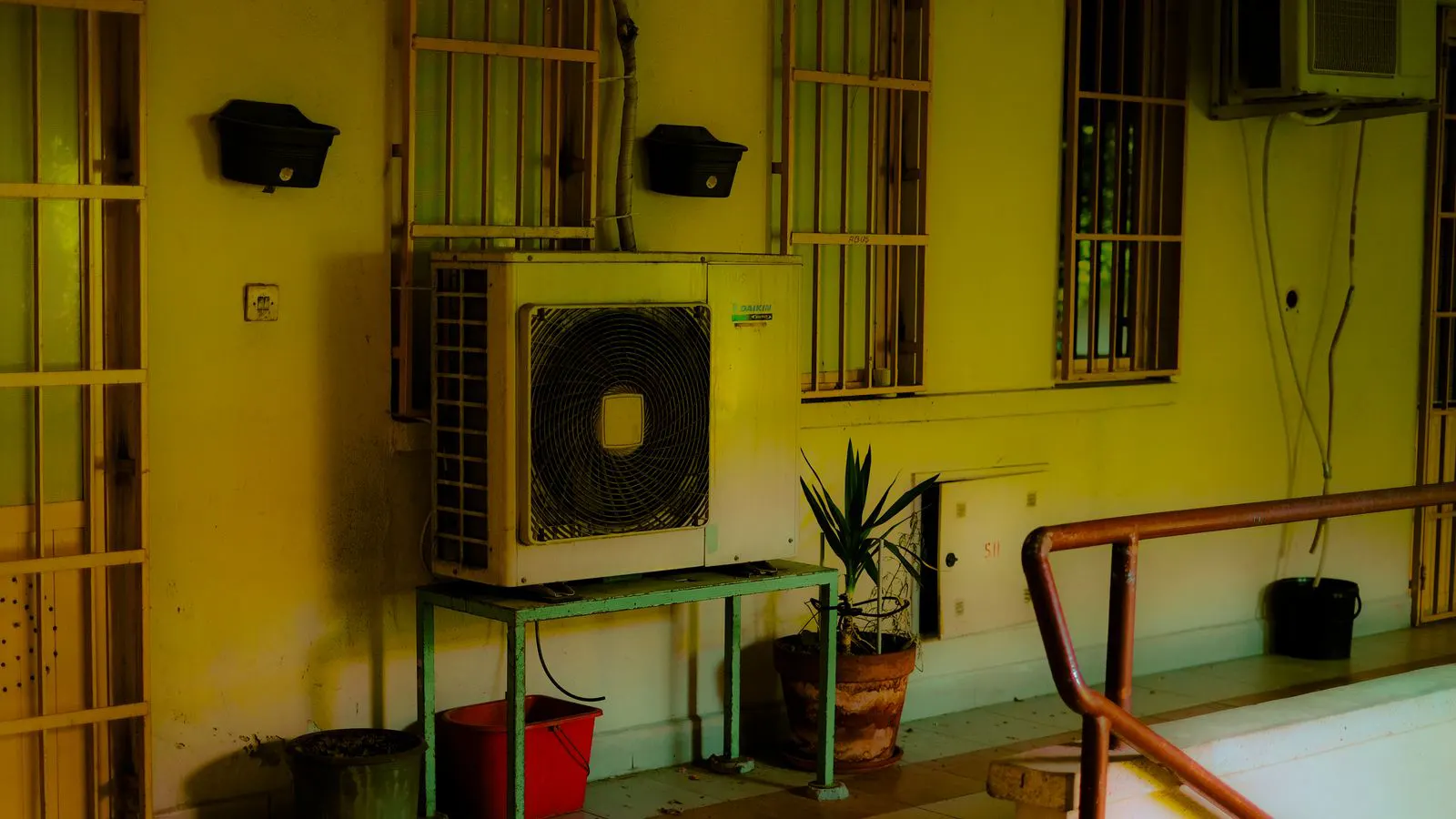 Large rooftop air conditioning units stored in a distribution warehouse