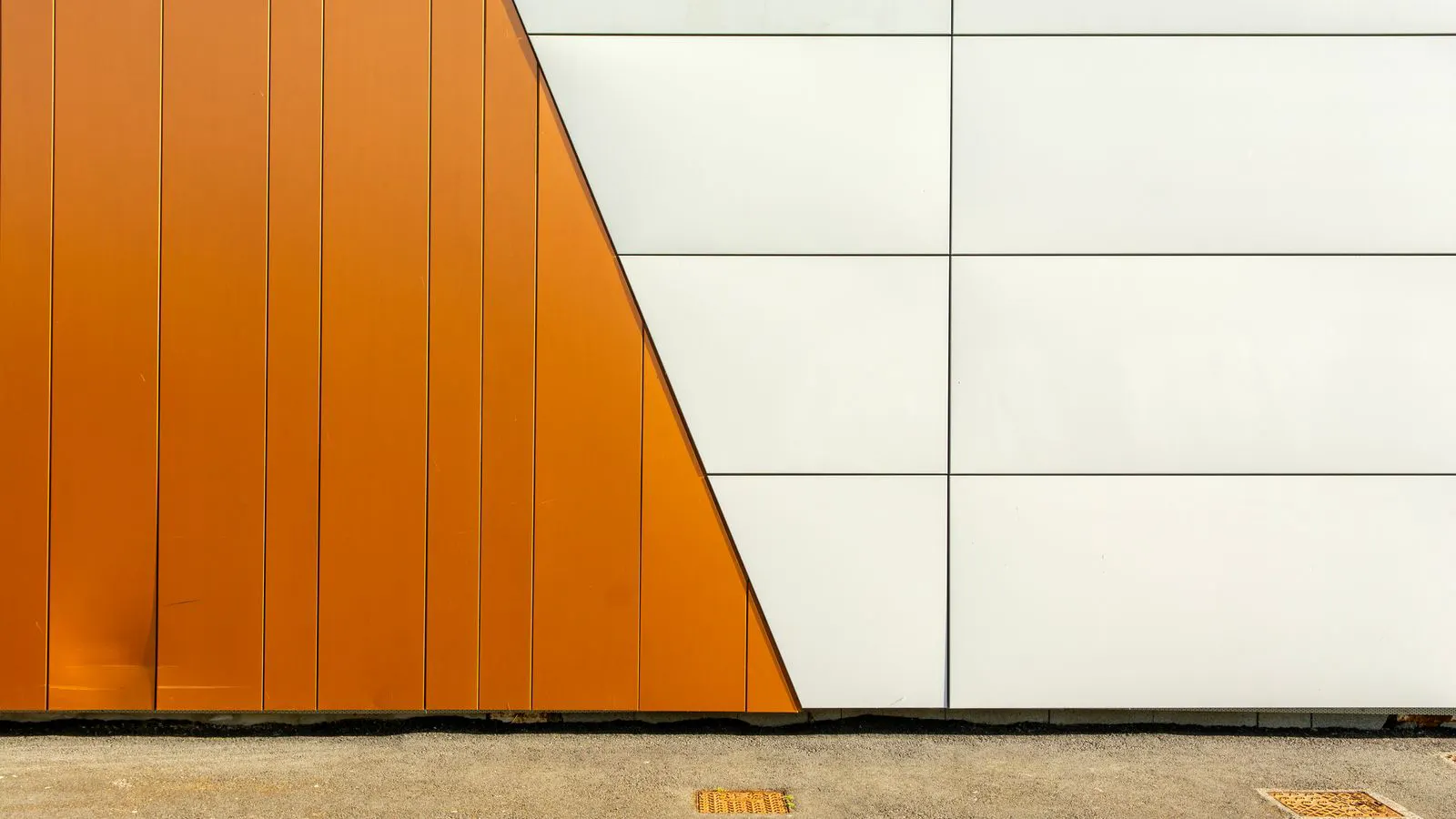 Close-up view of steel formwork with painted surface