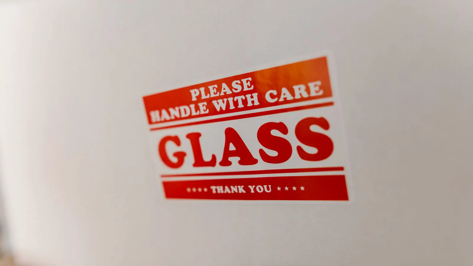 A close up view of a printed label roll on a production machine