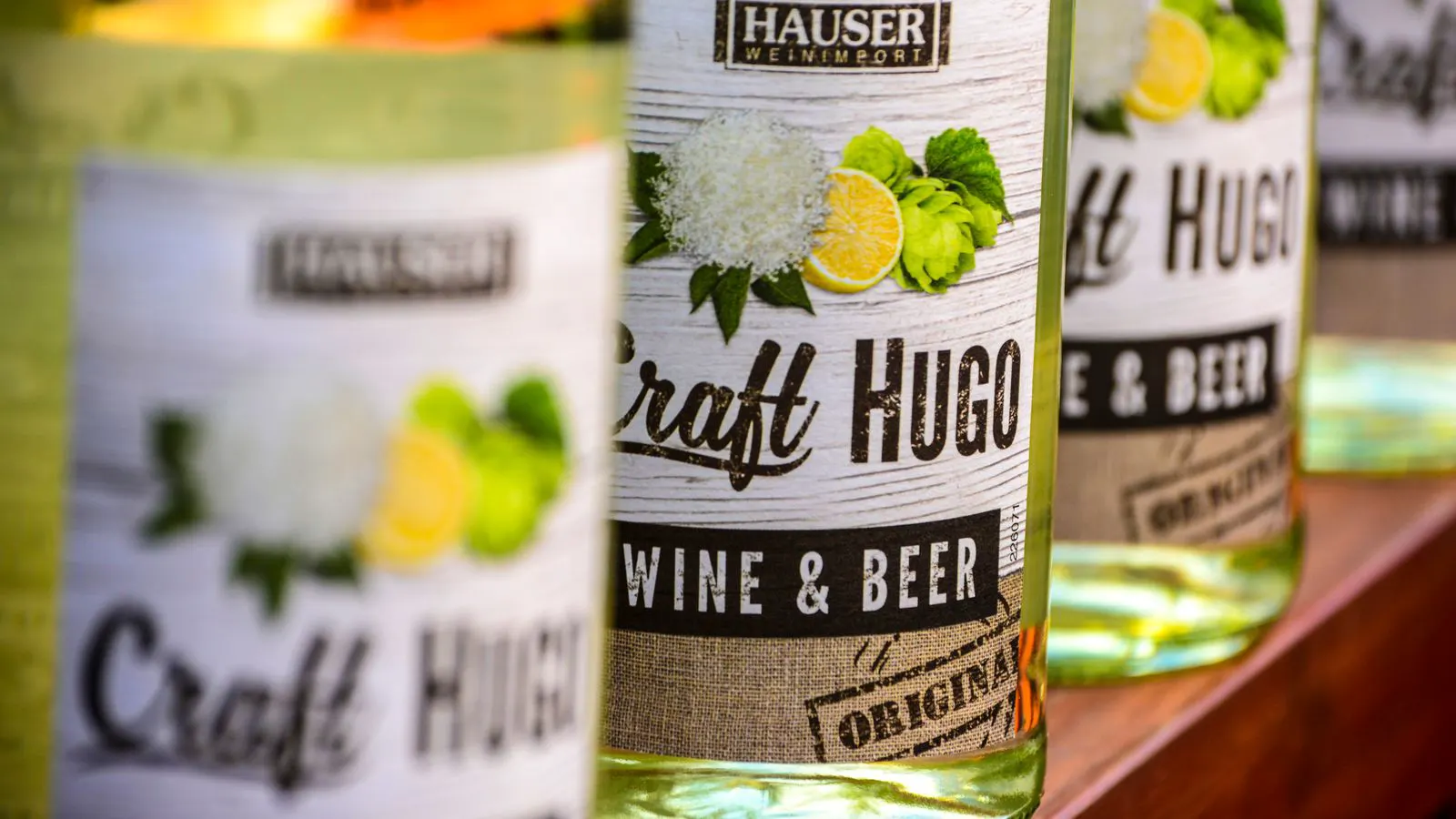 Close-up view of printed labels applied to glass bottles