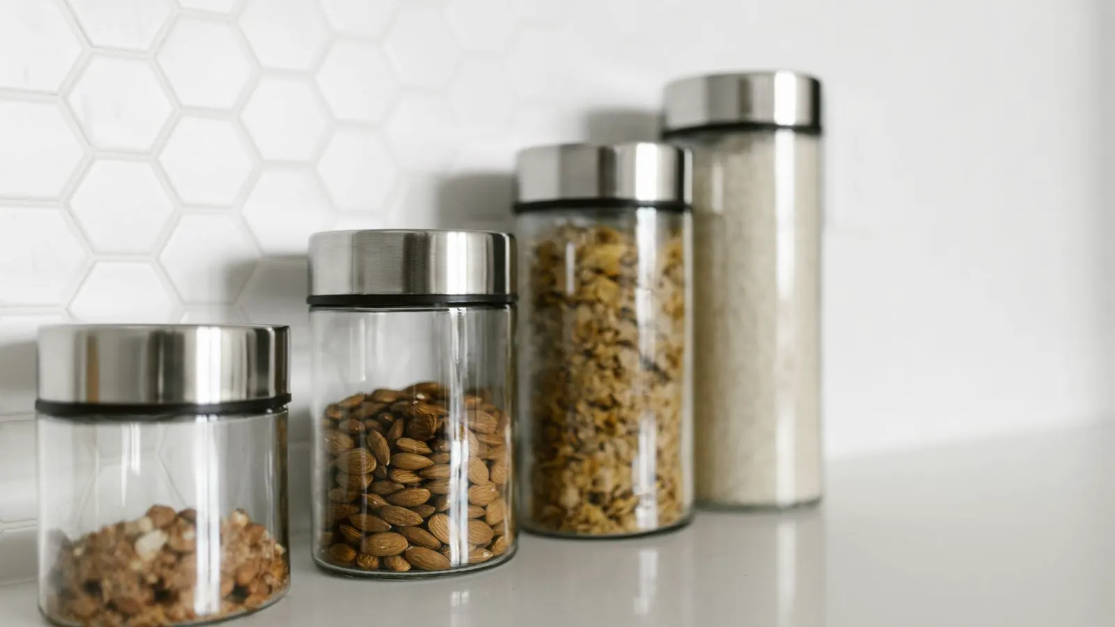 Close up of a glass jar with a screw band and lid